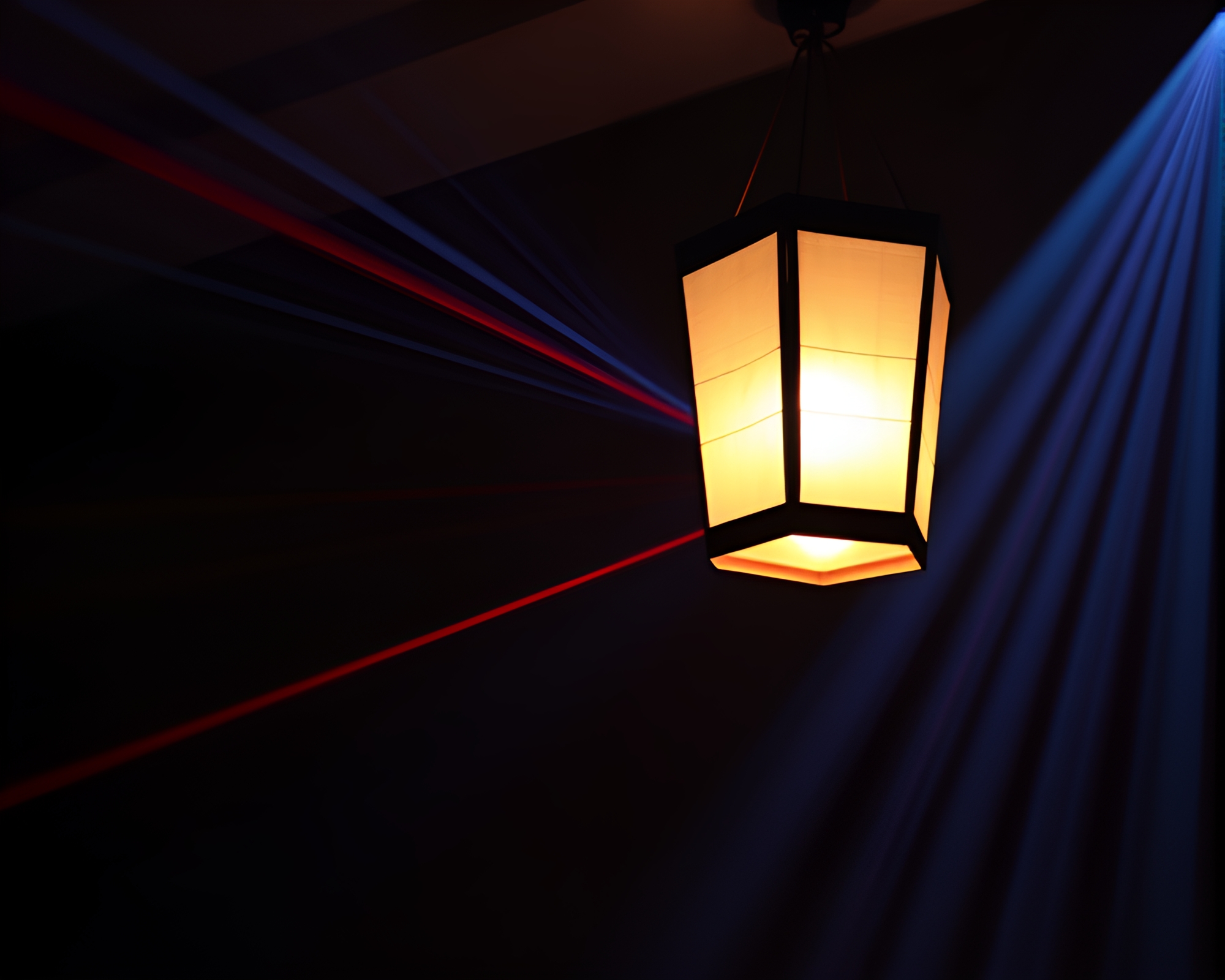 Laser Beam Illuminated Paper Lantern in Spotlight – free AI stock image