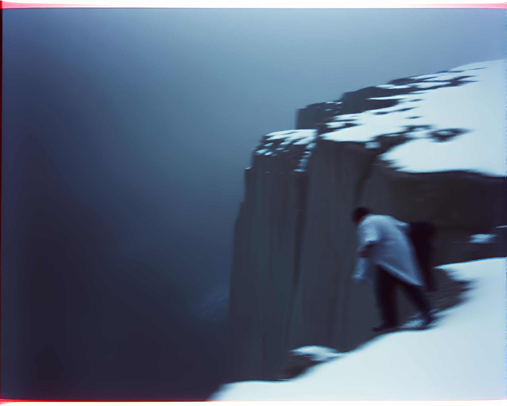 Ethereal Cliff Dancer: Slow Shutter Motion Capture – free AI stock image
