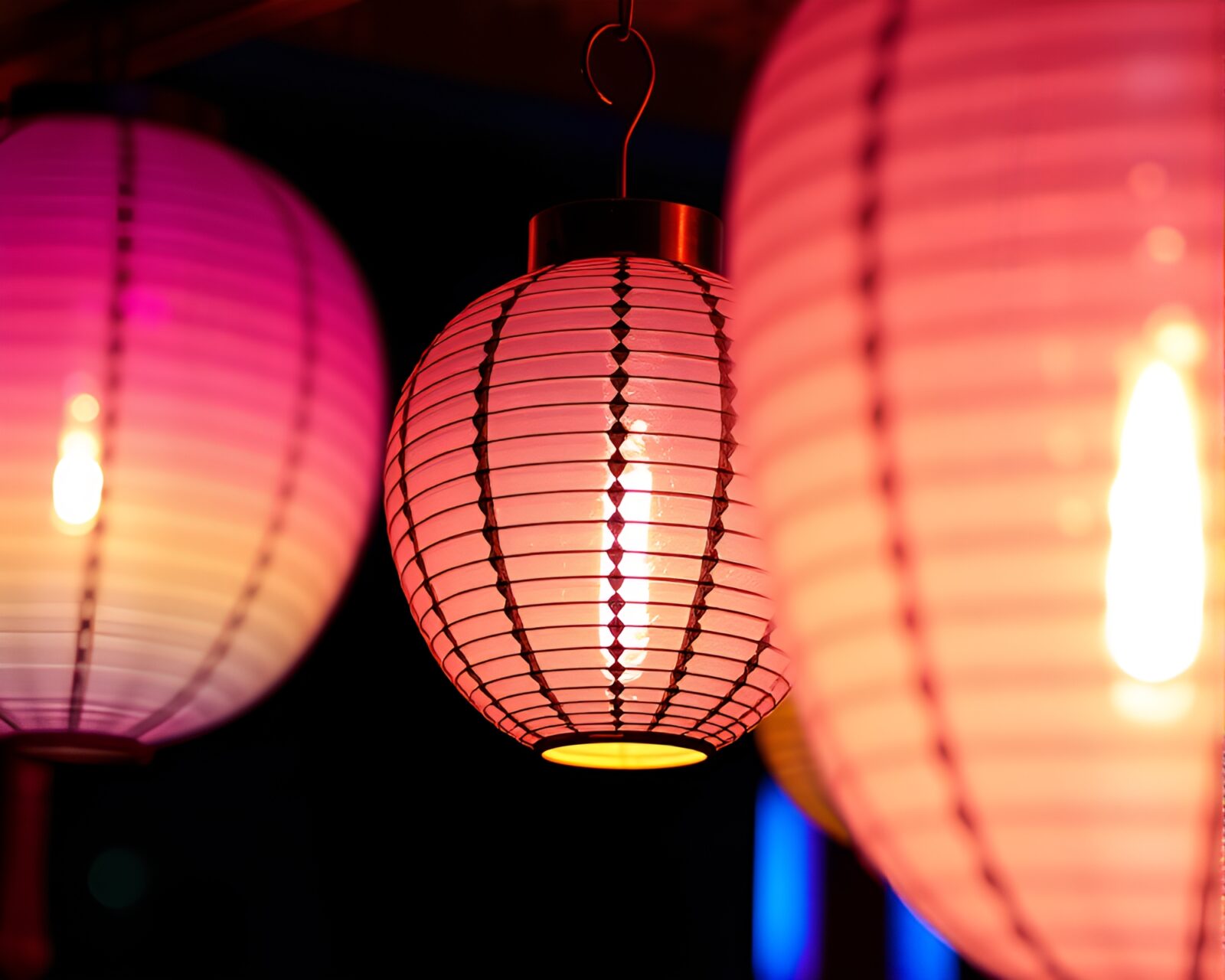 Pixelated paper lantern with shimmering iridescent hues in op art style