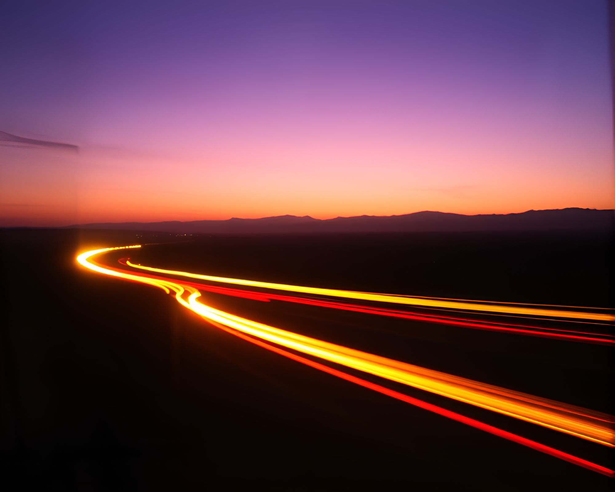 Necromantic Time Dilation: Golden Hour Car Light Trails – free AI stock image