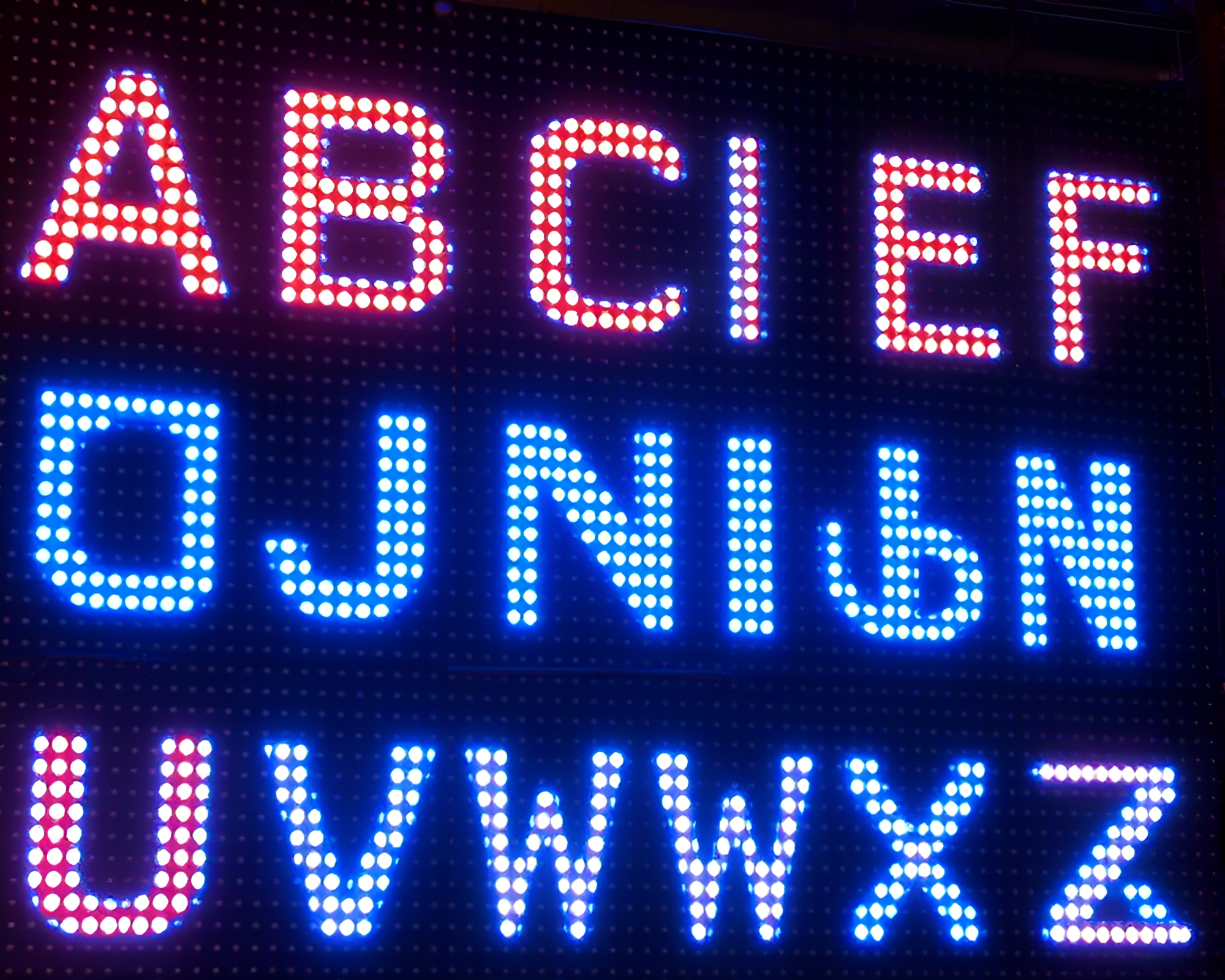 LED Pixel Grid Mural with Runic Alphabet – free AI stock image