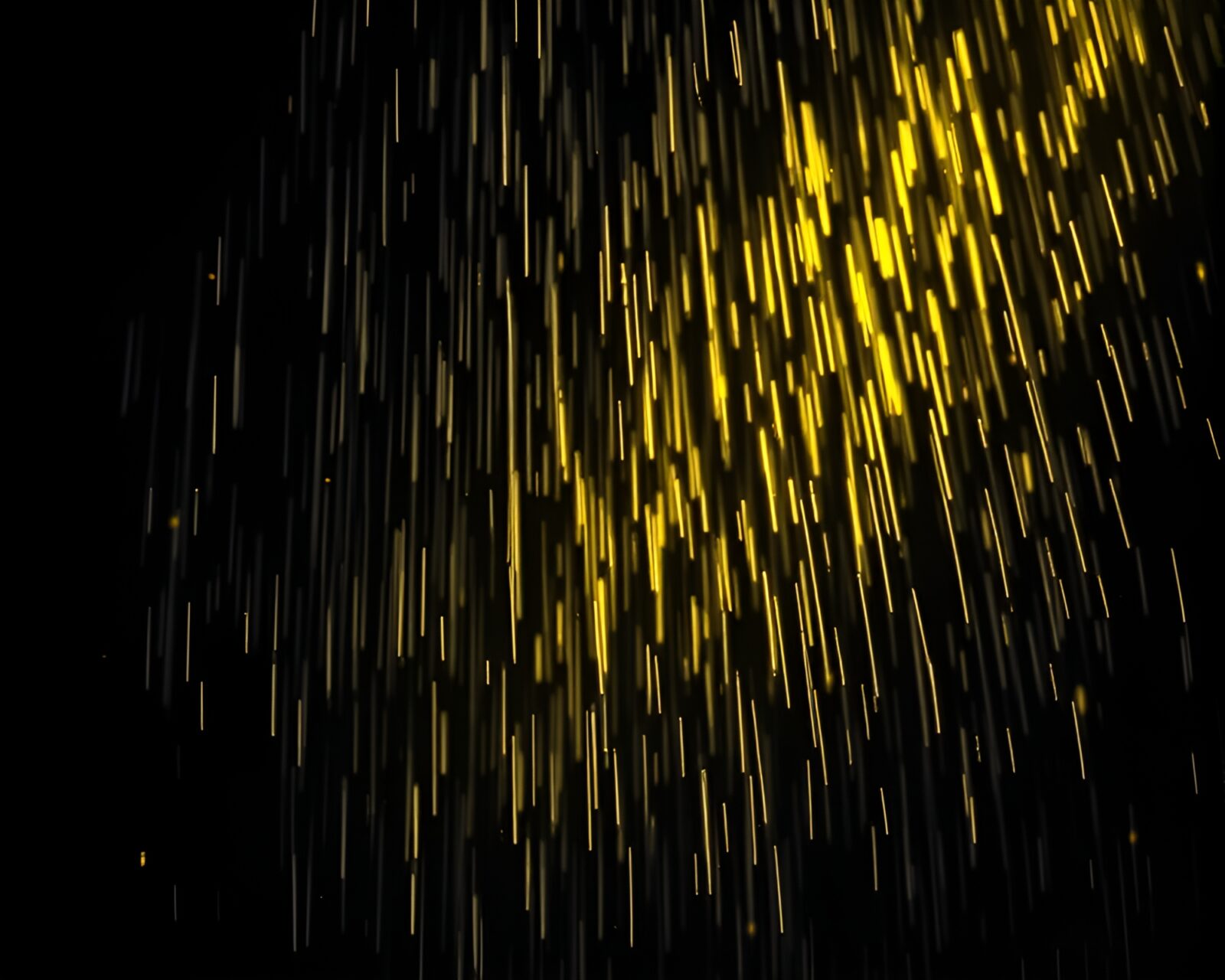 Glowing yellow hot spring with dramatic spotlight effect.