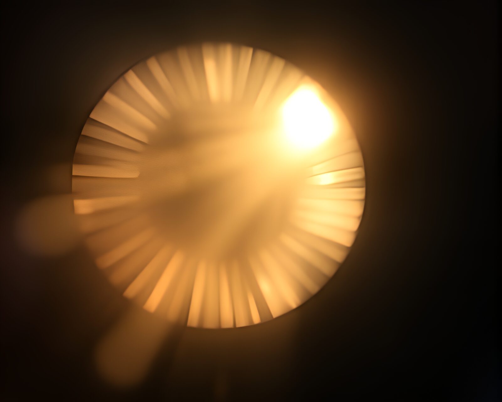 An artistic rendering of a smart contact lens with shading strokes