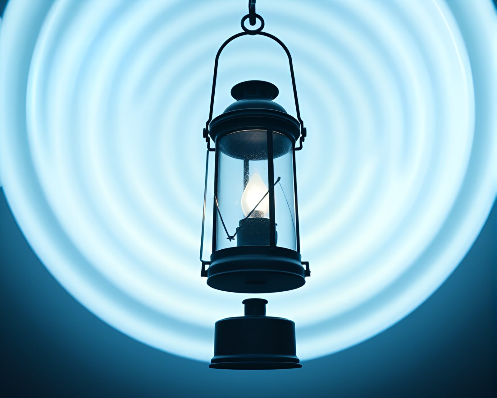Surrealist scene of glowing lantern in icy whiteout with circles