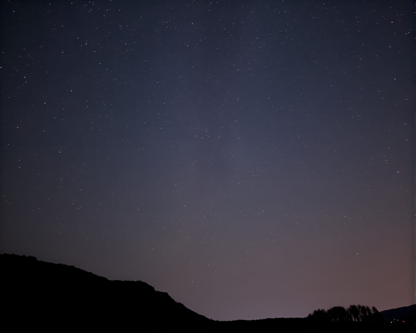 Glowing android surrounded by barcode stripe under twinkling starlit sky