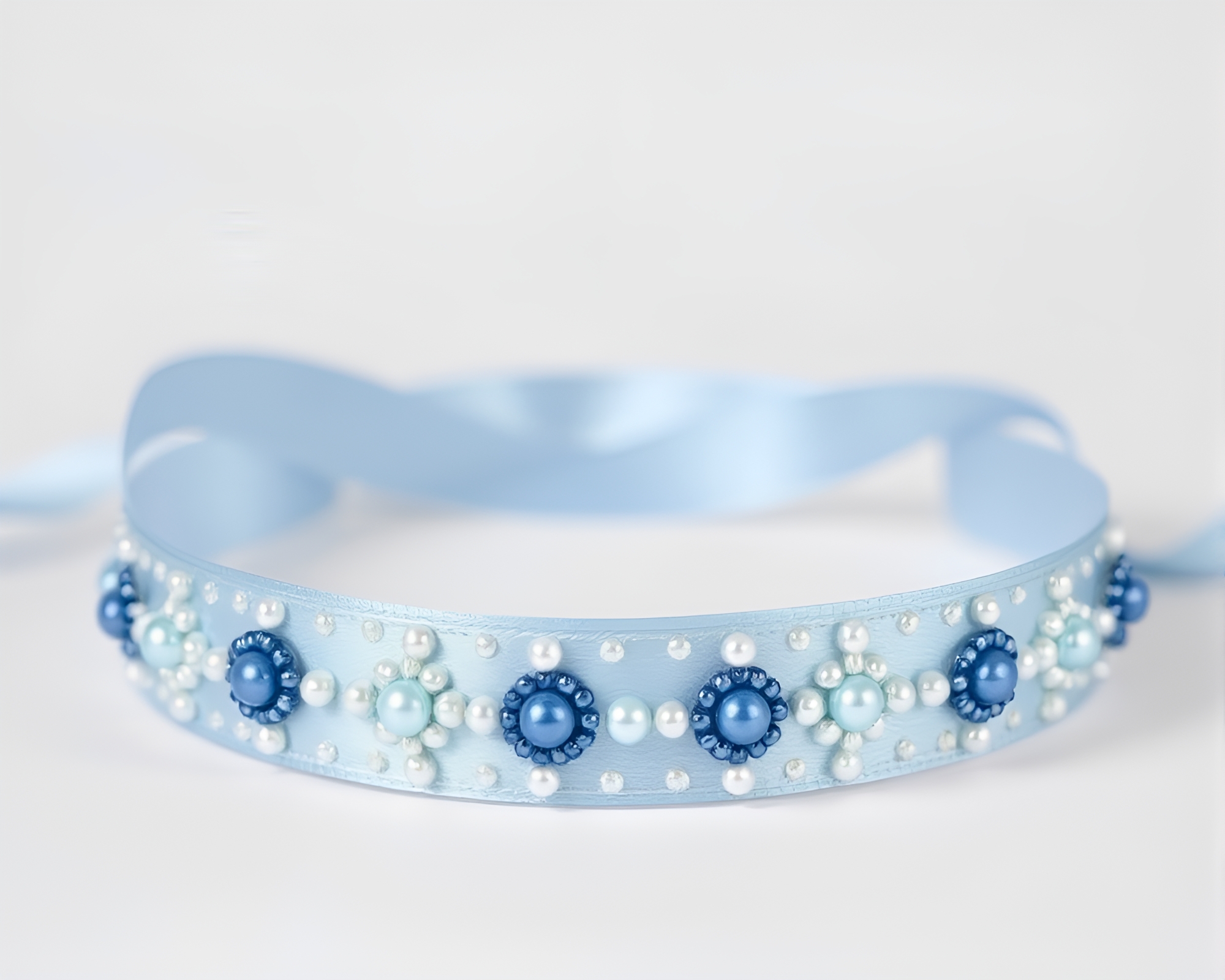 Satin Ribbon Beadwork Interwoven in Thermal Steel-Blue Imaging – free AI stock image