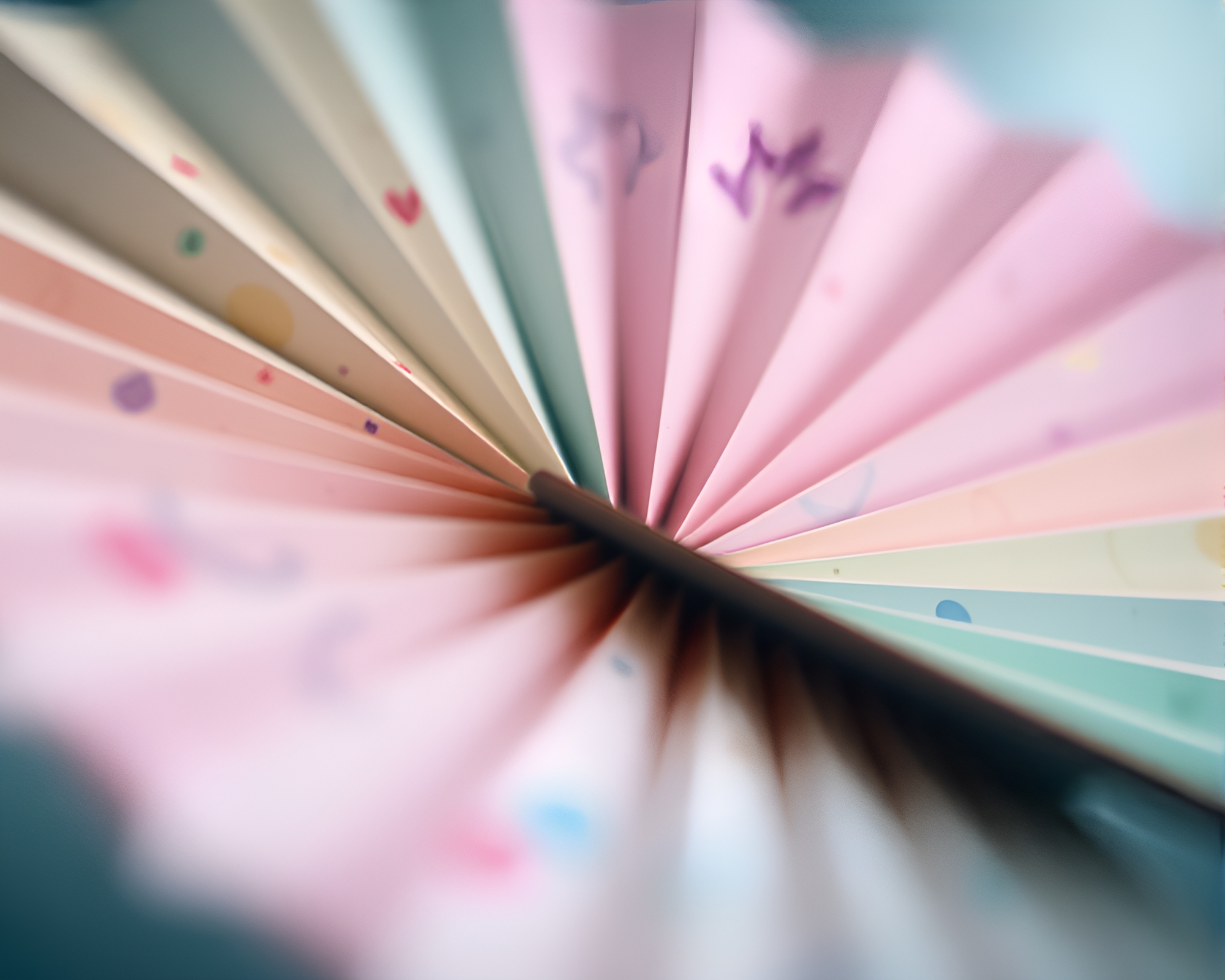 Pastel Hand-Painted Fan in Tilt-Shift Photography – free AI stock image