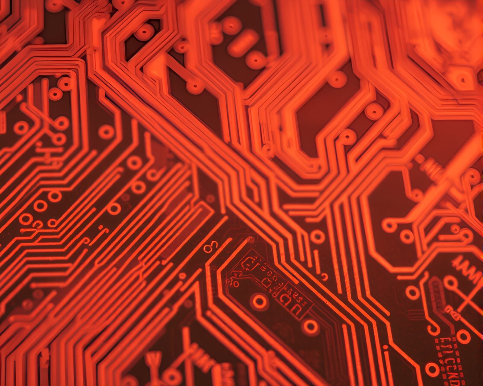 Close-up shot of circuit board pattern in sepia tones at sunset