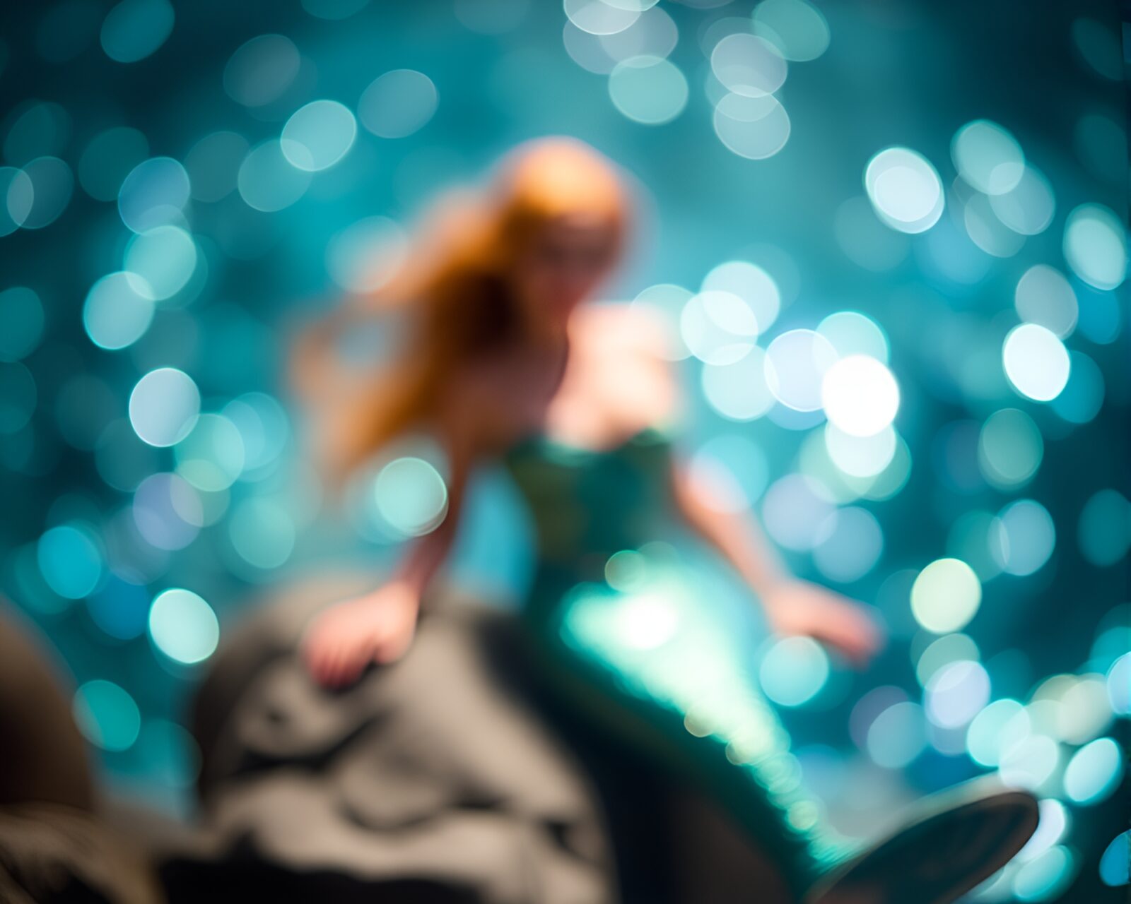 Enchanting mermaid surrounded by iridescent bokeh in underwater scene