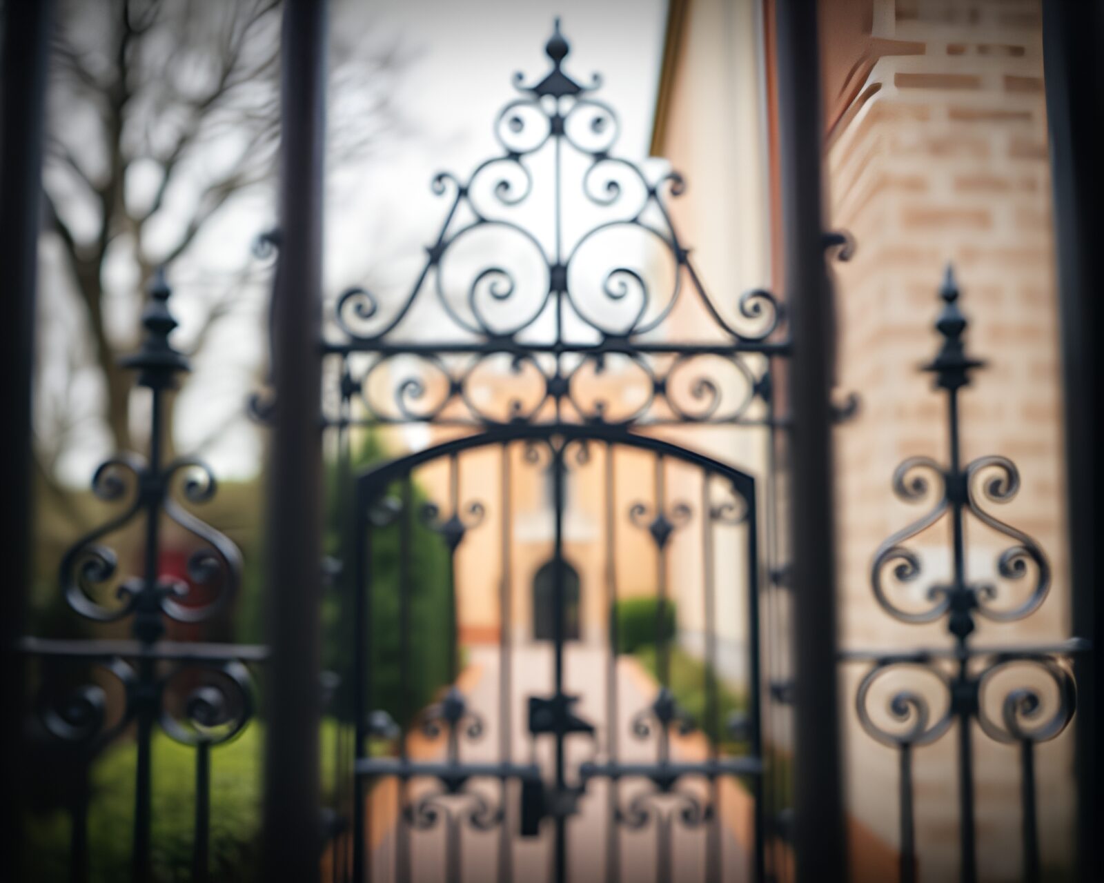 Pixel art image of a selective focus wrought iron gate