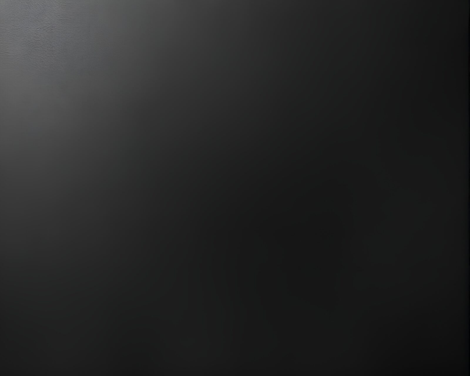 Charcoal strokes form binary code in textured earth tones