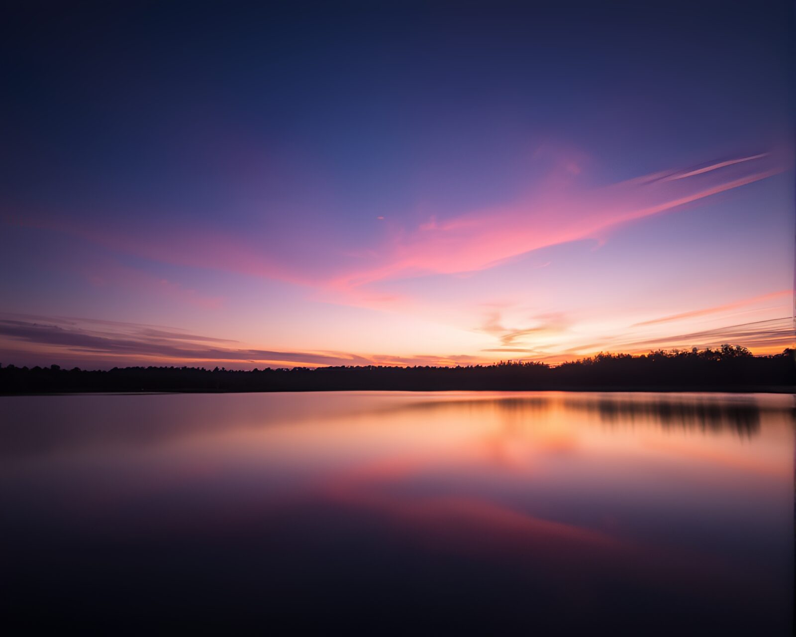 A mystical pink glow reflecting in a magic circle