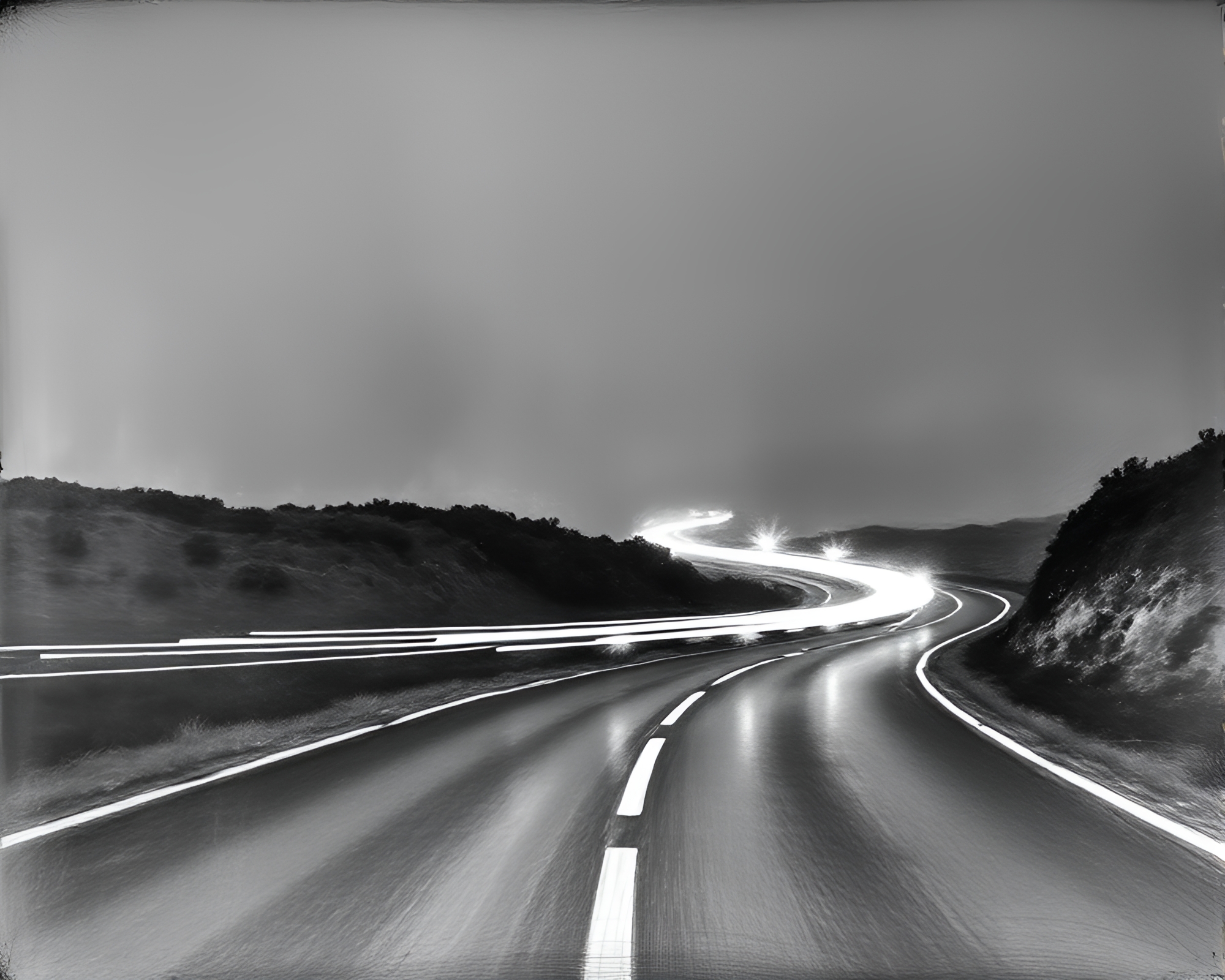 Enhanced Reality: Charcoal Landscape with Car Light Trails – free AI stock image