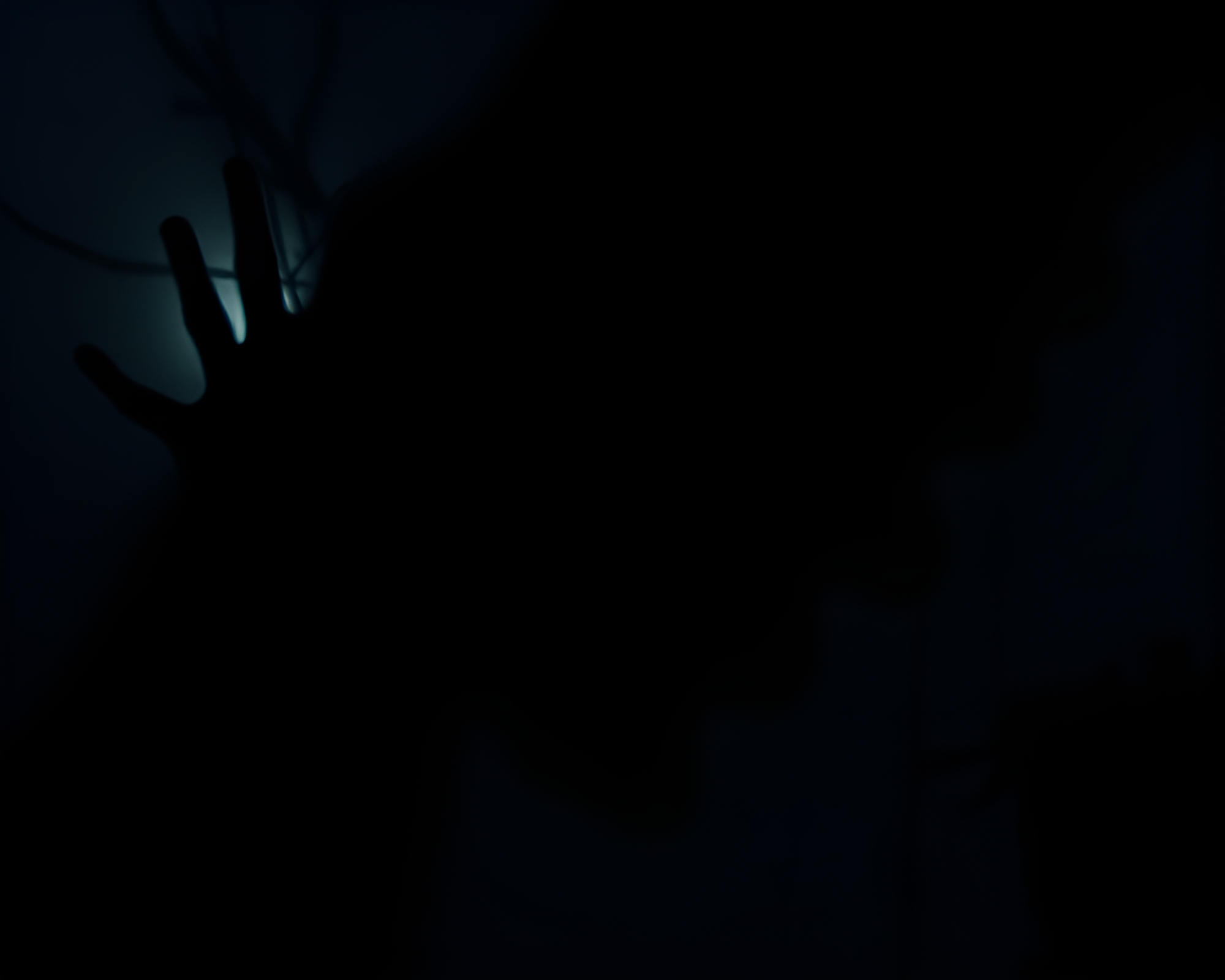 Vampiric Silhouette amidst Fractal Glow Shadows – free AI stock image