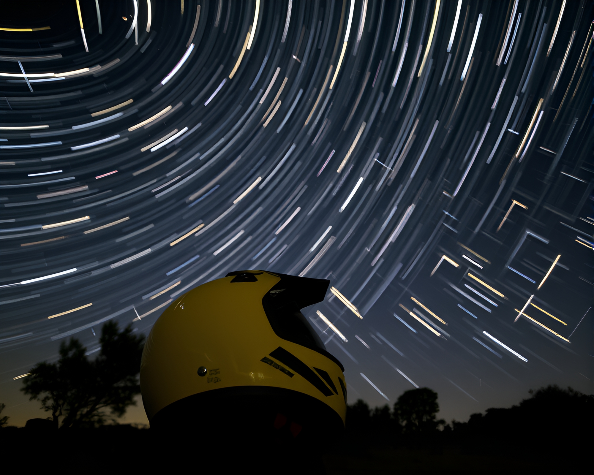 Mesmerizing Star Trails Helmets in Lemon Yellow Night – free AI stock image