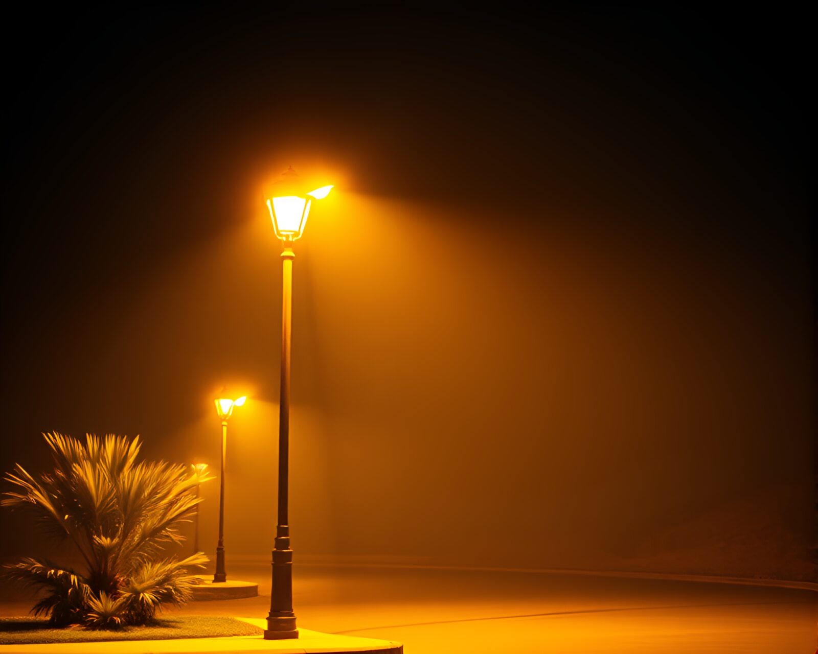 An oasis desert scene with a single streetlamp glowing