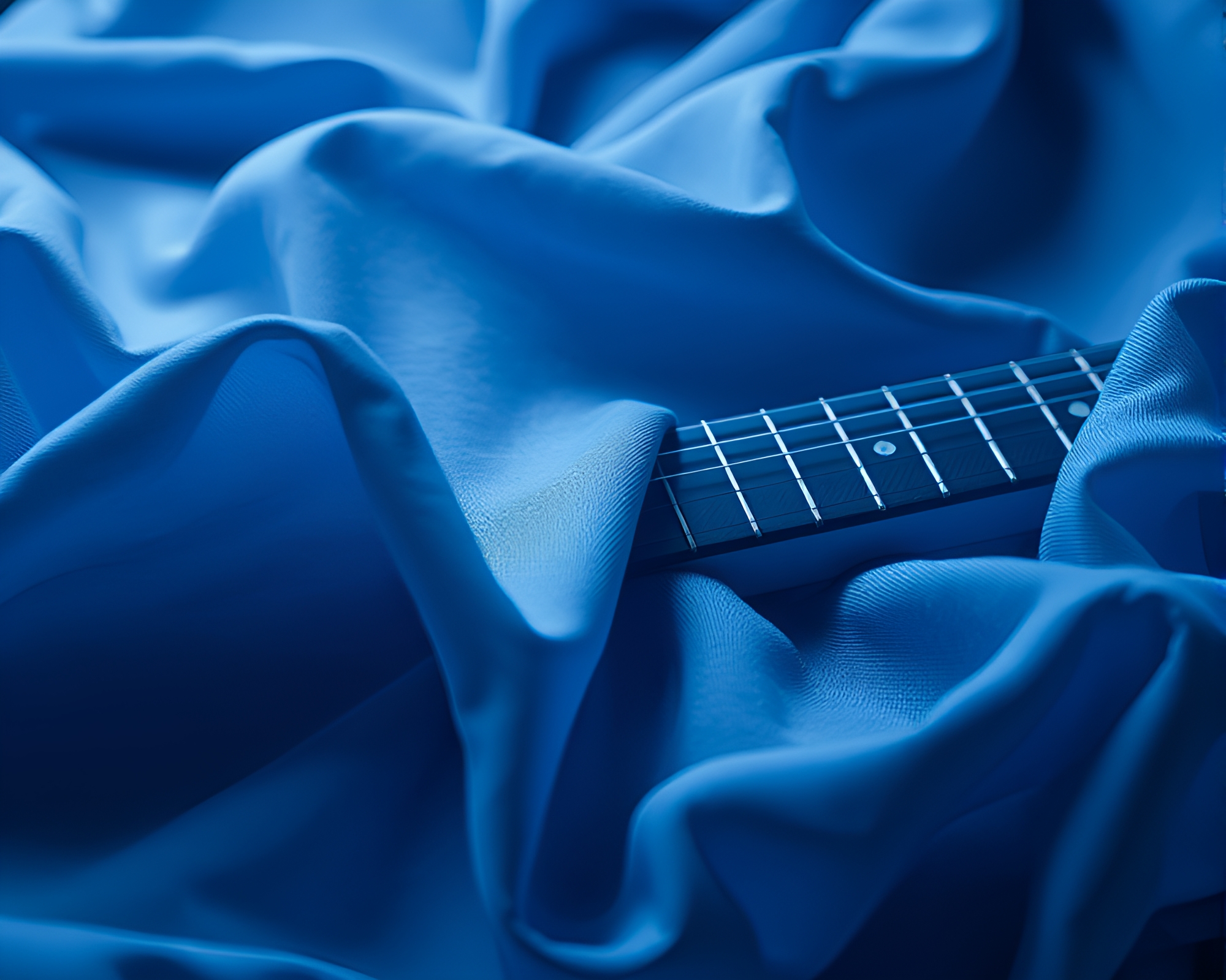 Guitar in Blue Fabric Folds – free AI stock image