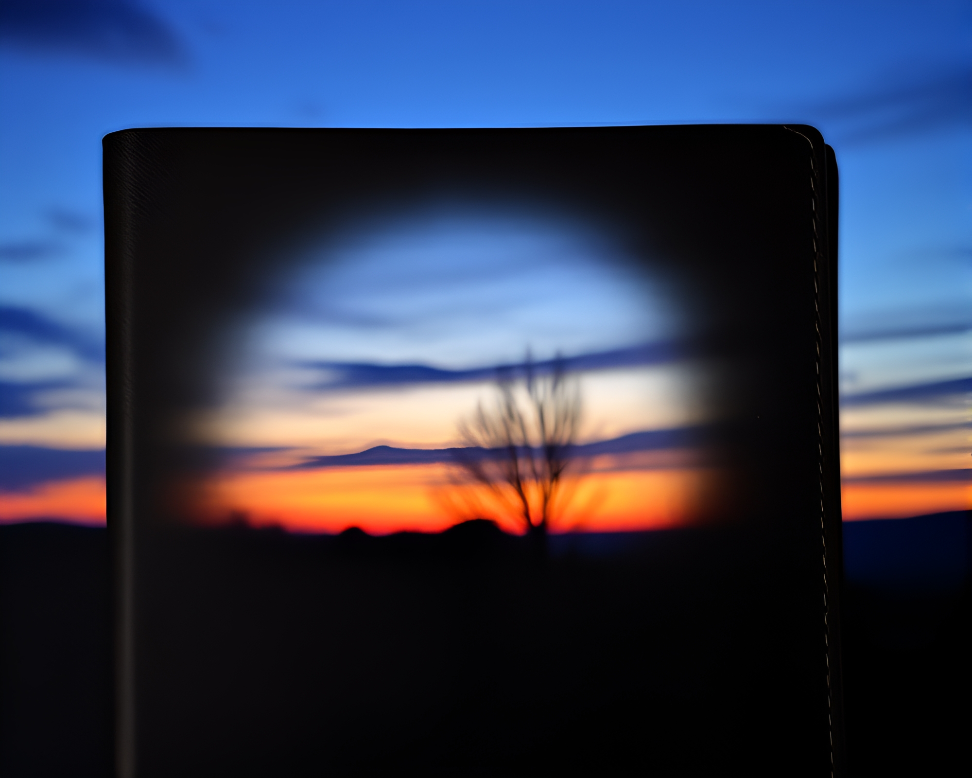 Leather-bound Diary at Dusk: Rule of Thirds Light Painting – free AI stock image