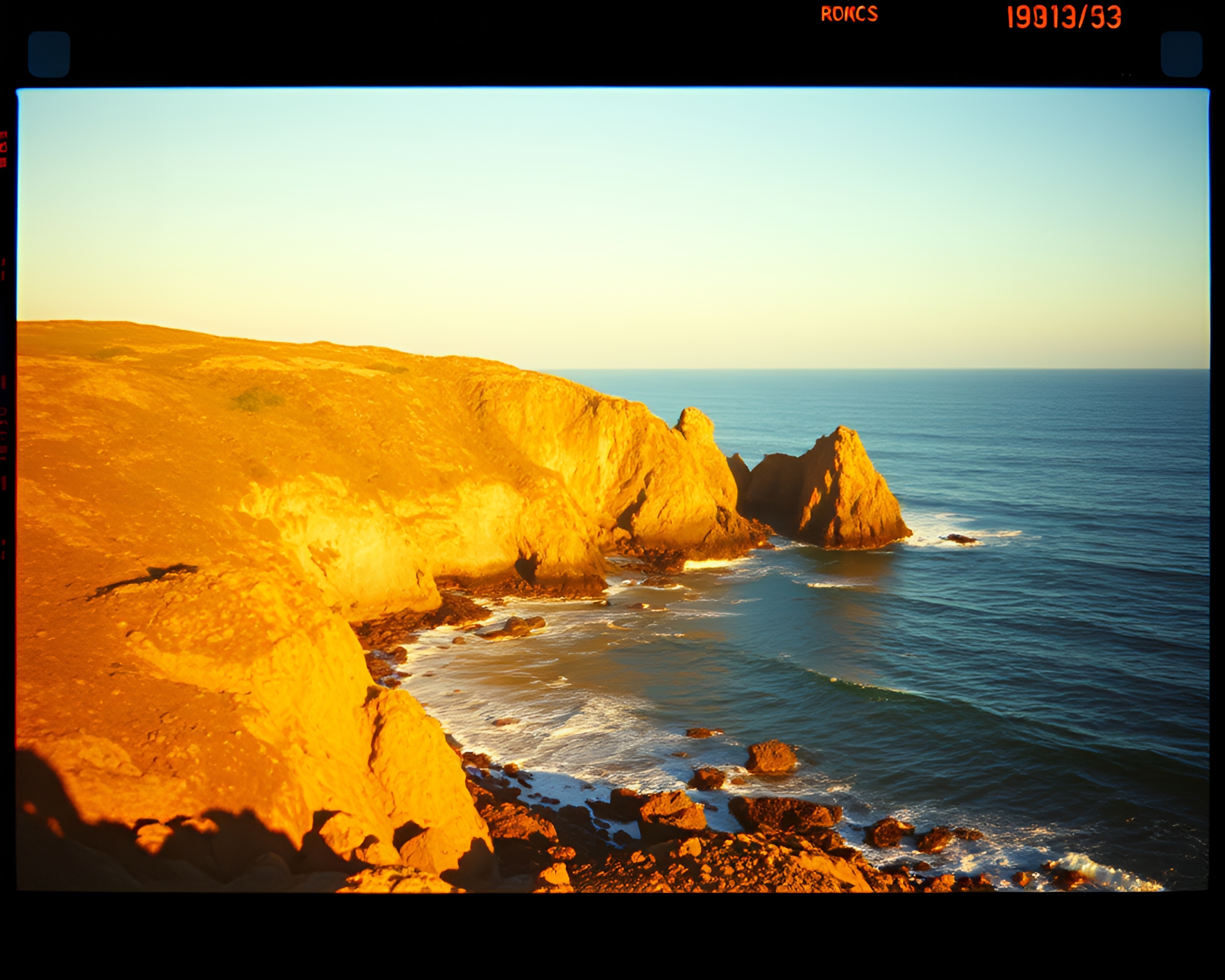Rocky Coastline Film Sprocket Holes Golden Hour – free AI stock image