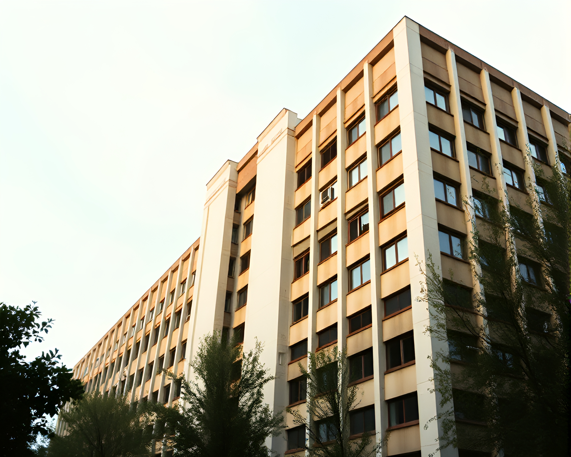 Gritty 90s Environmental Portrait at Brutalist Building – free AI stock image