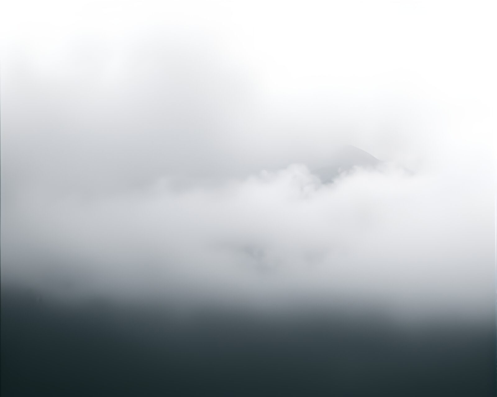 Surreal misty mountain framed in film strip border