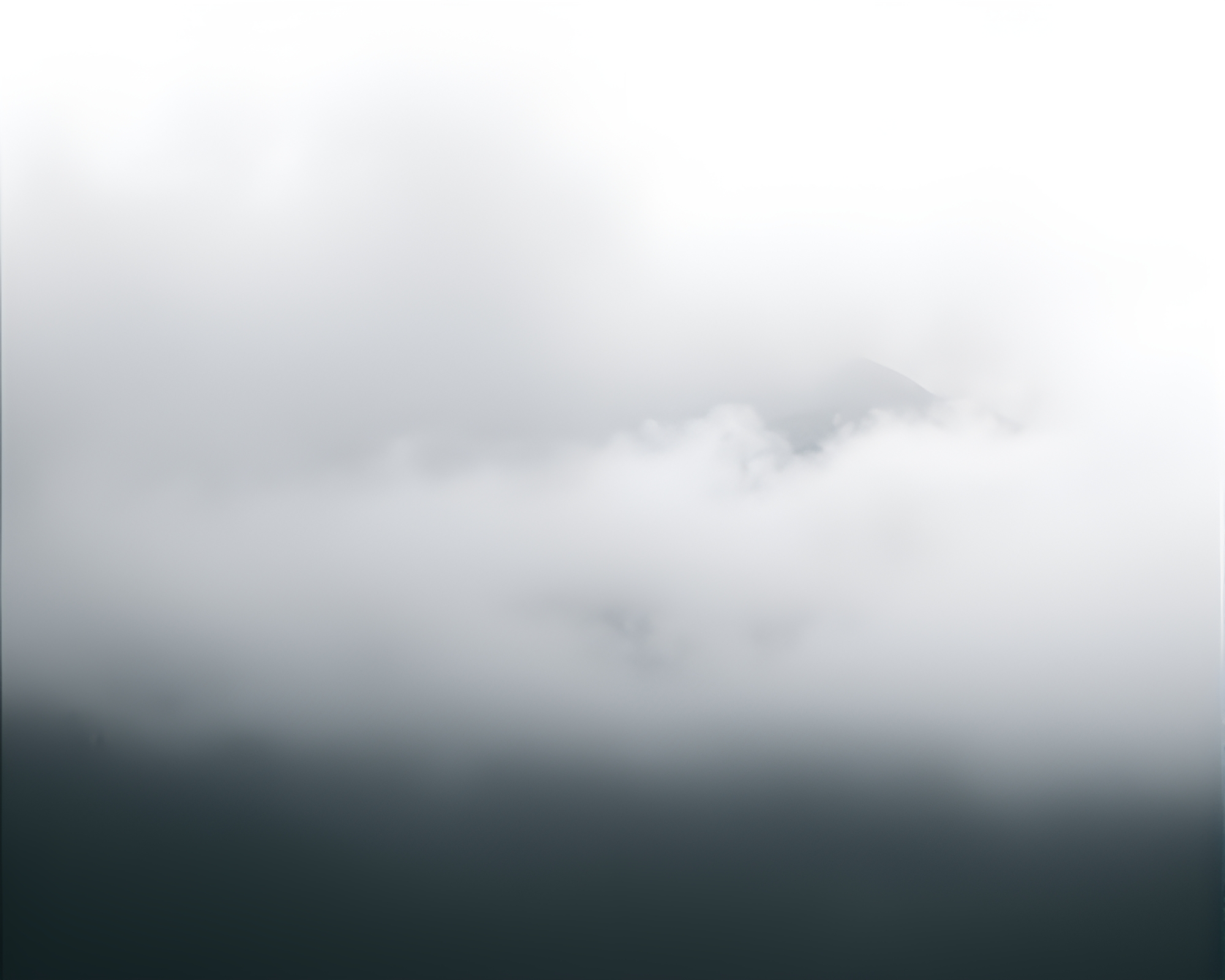 Mist-shrouded Mountain Peak with Rule of Thirds Film Border – free AI stock image