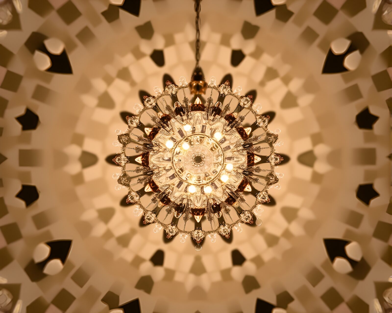 Vibrant kaleidoscope effect rests on crystal chandelier masterpiece