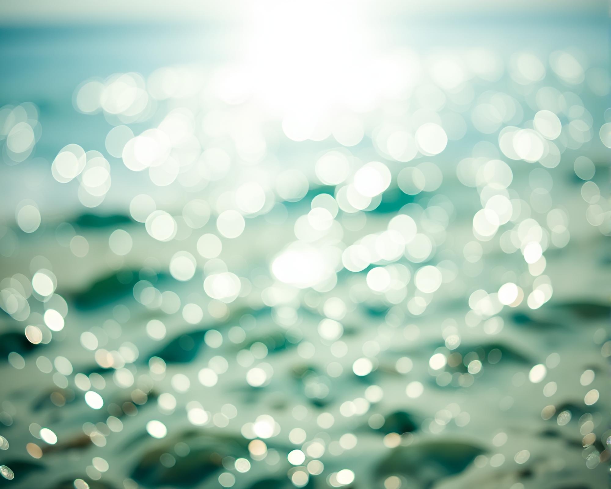 Serene Beachscape: Emerald Sunshine and Bokeh Magic – free AI stock image