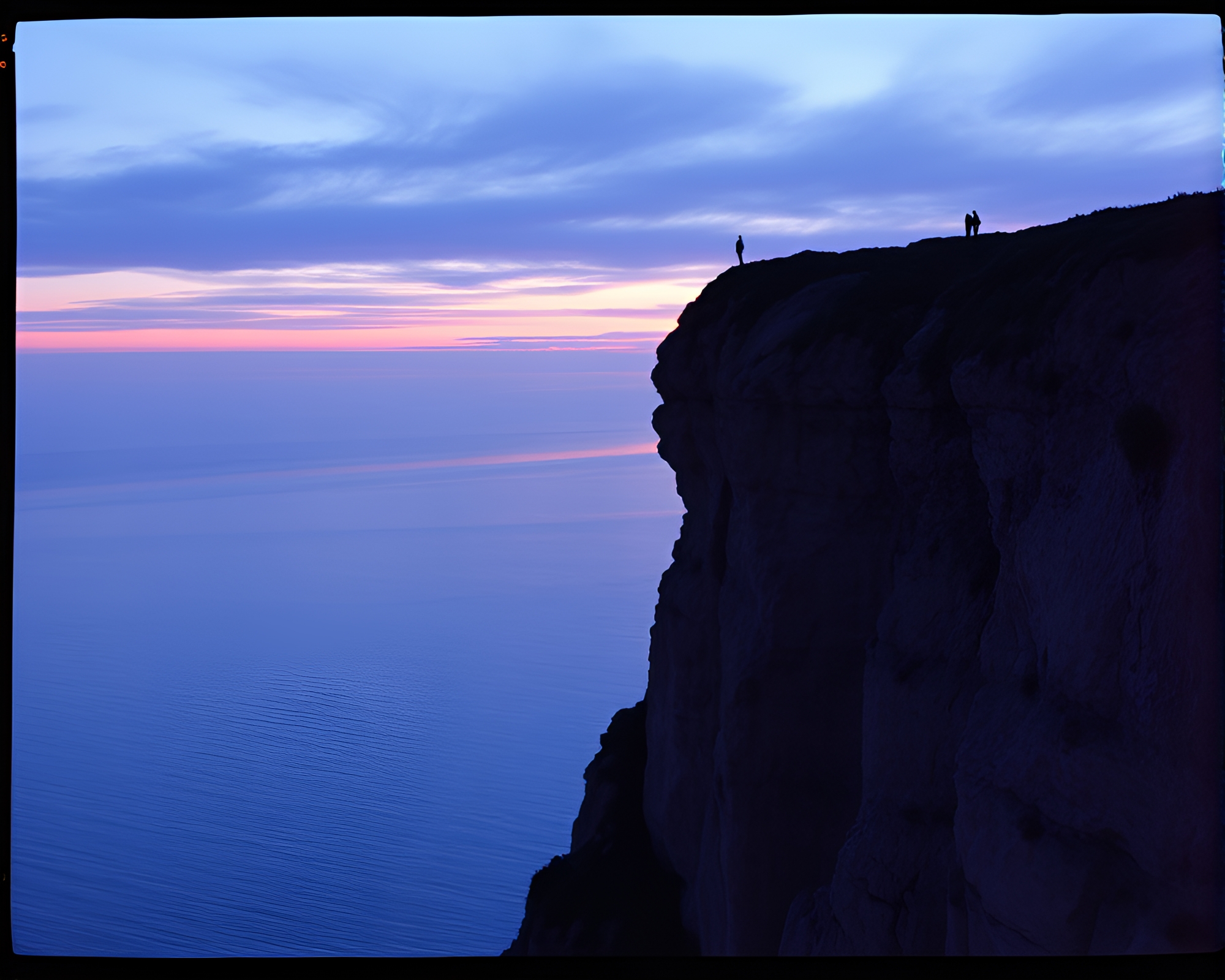 Ink Splashes Cliff Dusk Film Border – free AI stock image