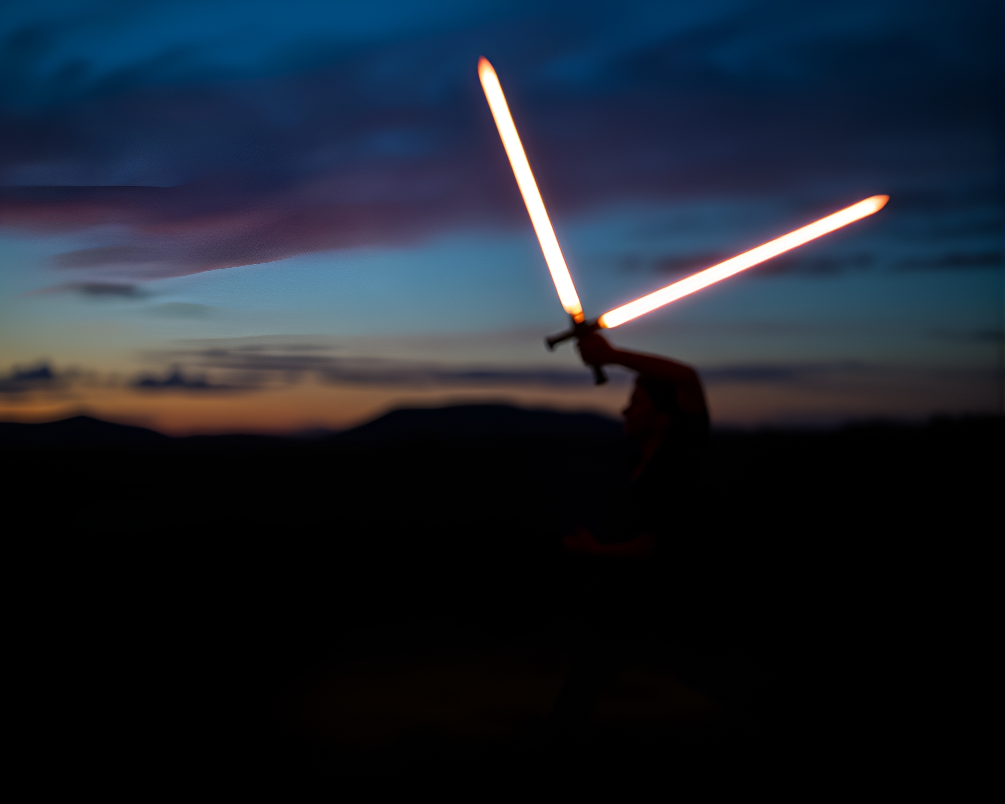 Sword-wielding warrior at twilight blue hour – free AI stock image