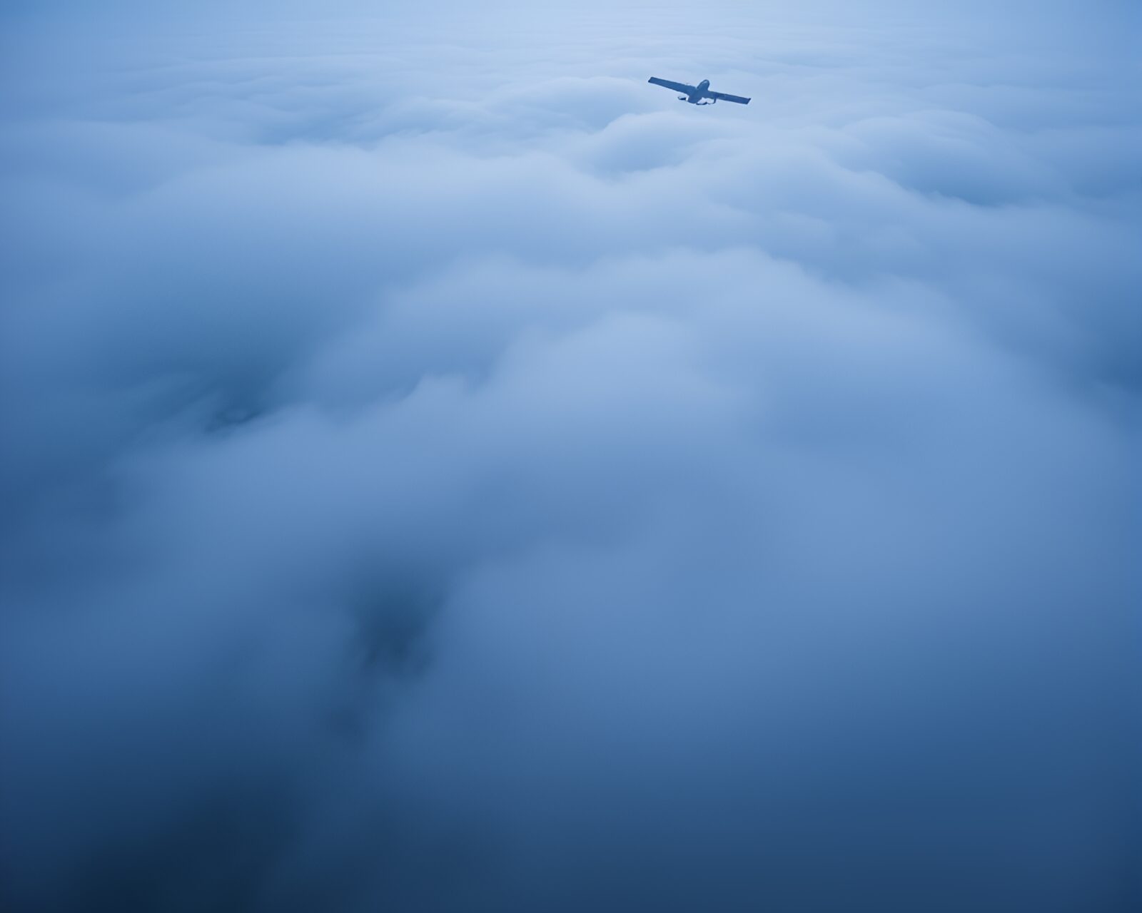 Satellite obscured by drifting fog in creative artwork