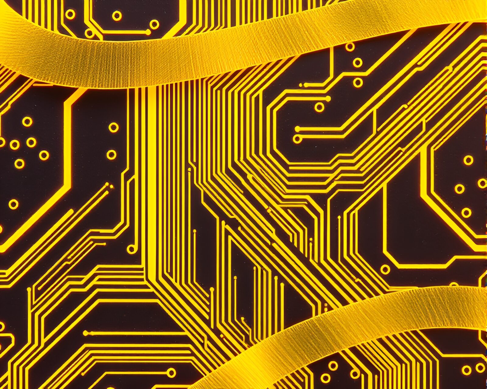 Satin ribbon intertwining with yellow circuit board traces