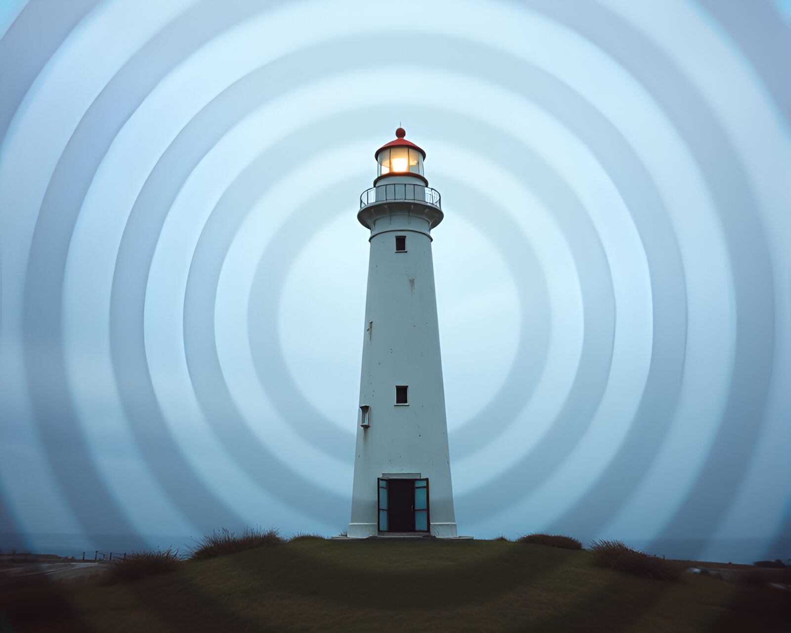 Abstract concentric circles frame an eerie abandoned lighthouse