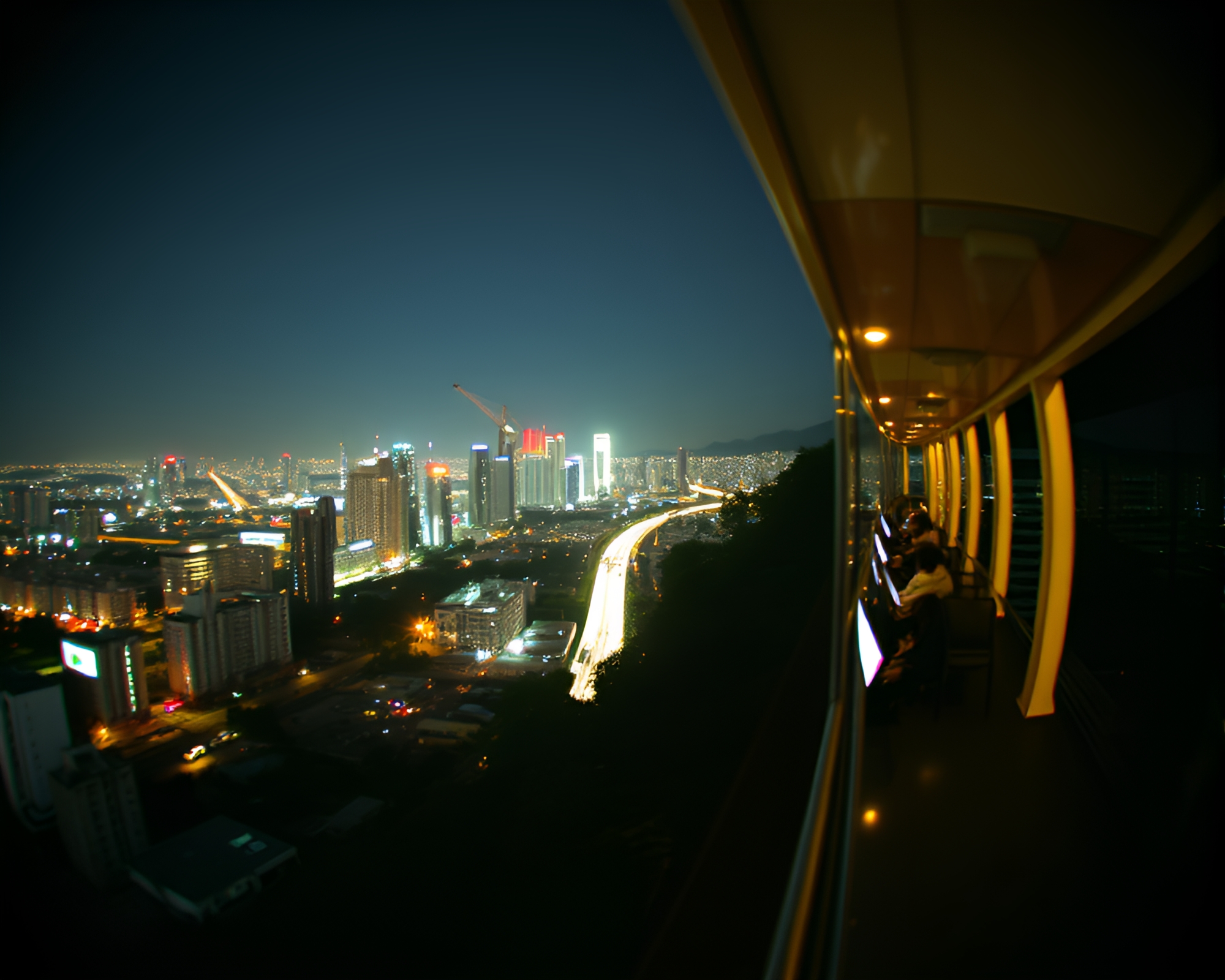 Panoramic Monorail Journey Through Cross-Processed Skyline – free AI stock image