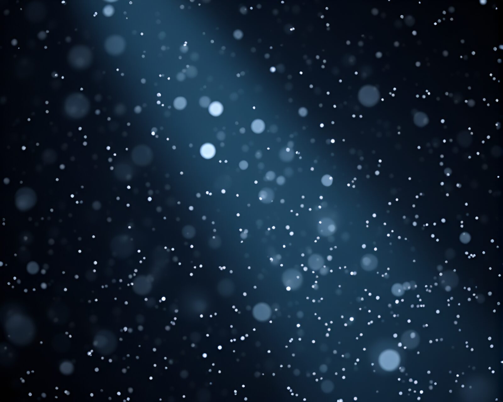 Satellite covered in intricate snowflake patterns under spotlight