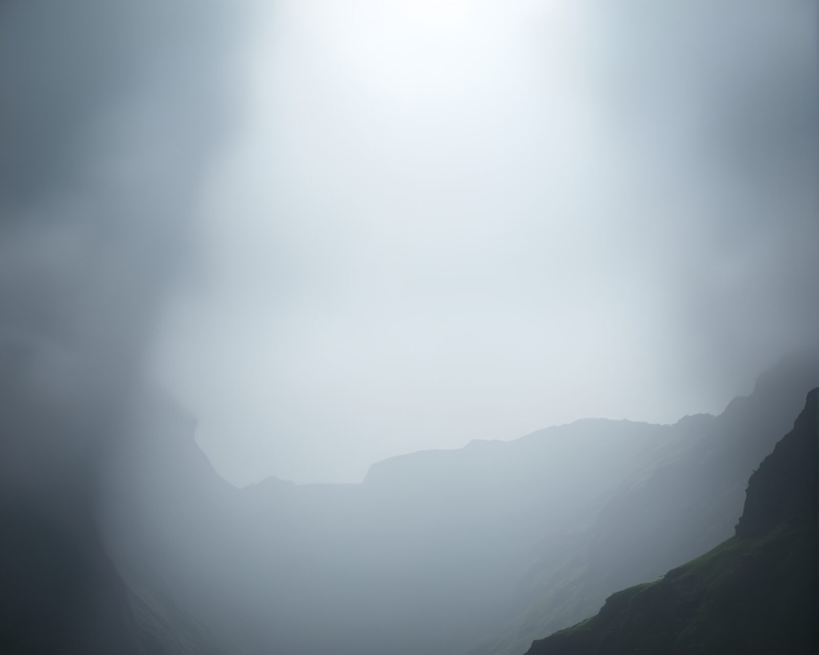 Majestic plateau with spotlight effect enveloped in fog