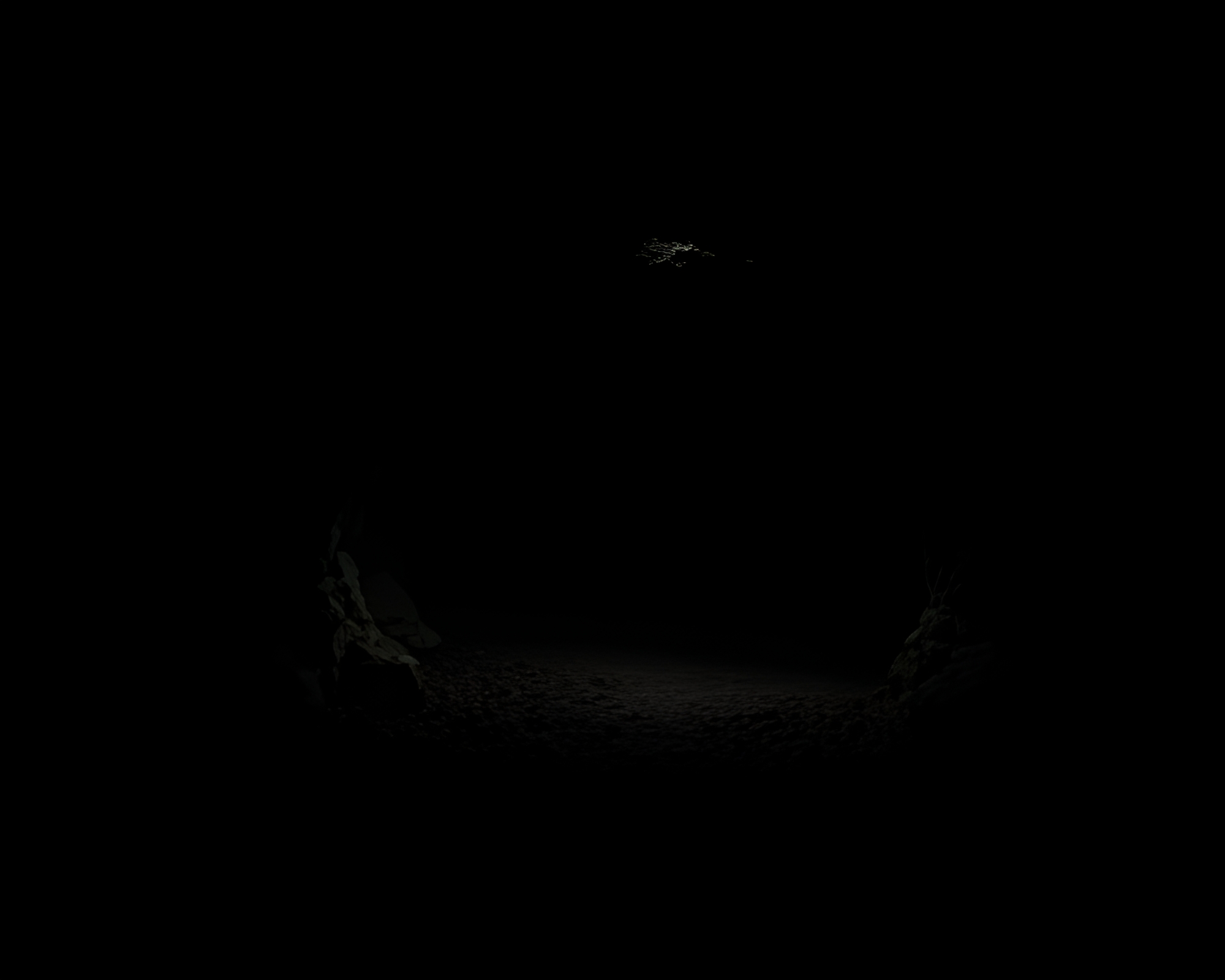 Cavernous Geometric Patterns in Dark Cave Entrance – free AI stock image
