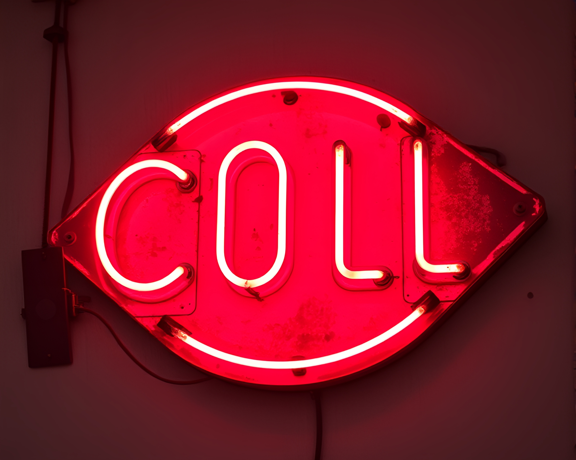 Retro Neon Sign Glows among Rust Patina Decay – free AI stock image
