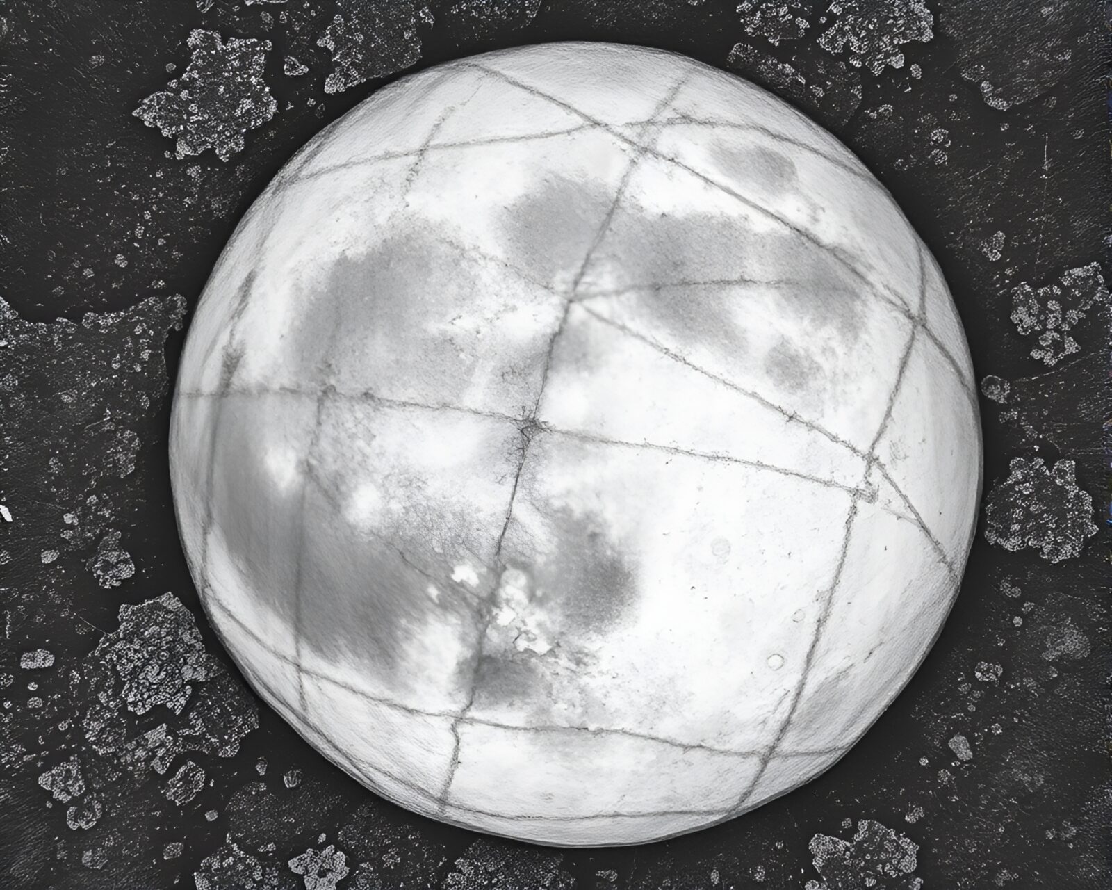 Conté crayon drawing of a grayscale stone circle with lichen