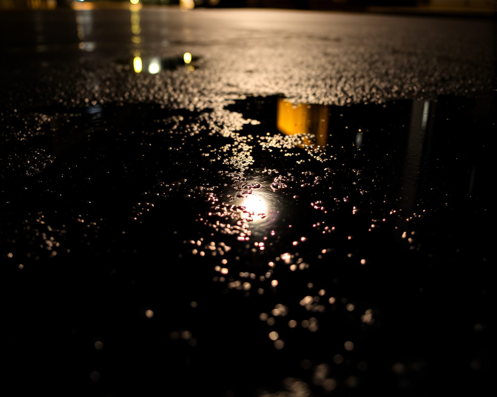 Grainy textured image of fiery Phoenix reflection in spotlight