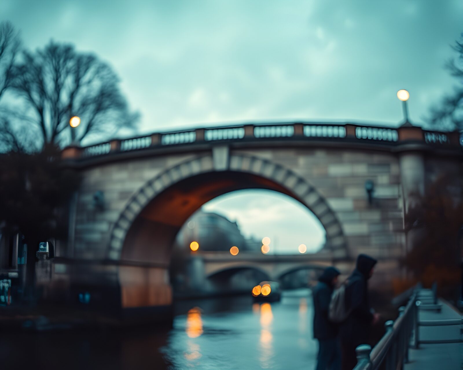 Low-angle shot of bokeh effect arch bridge over river