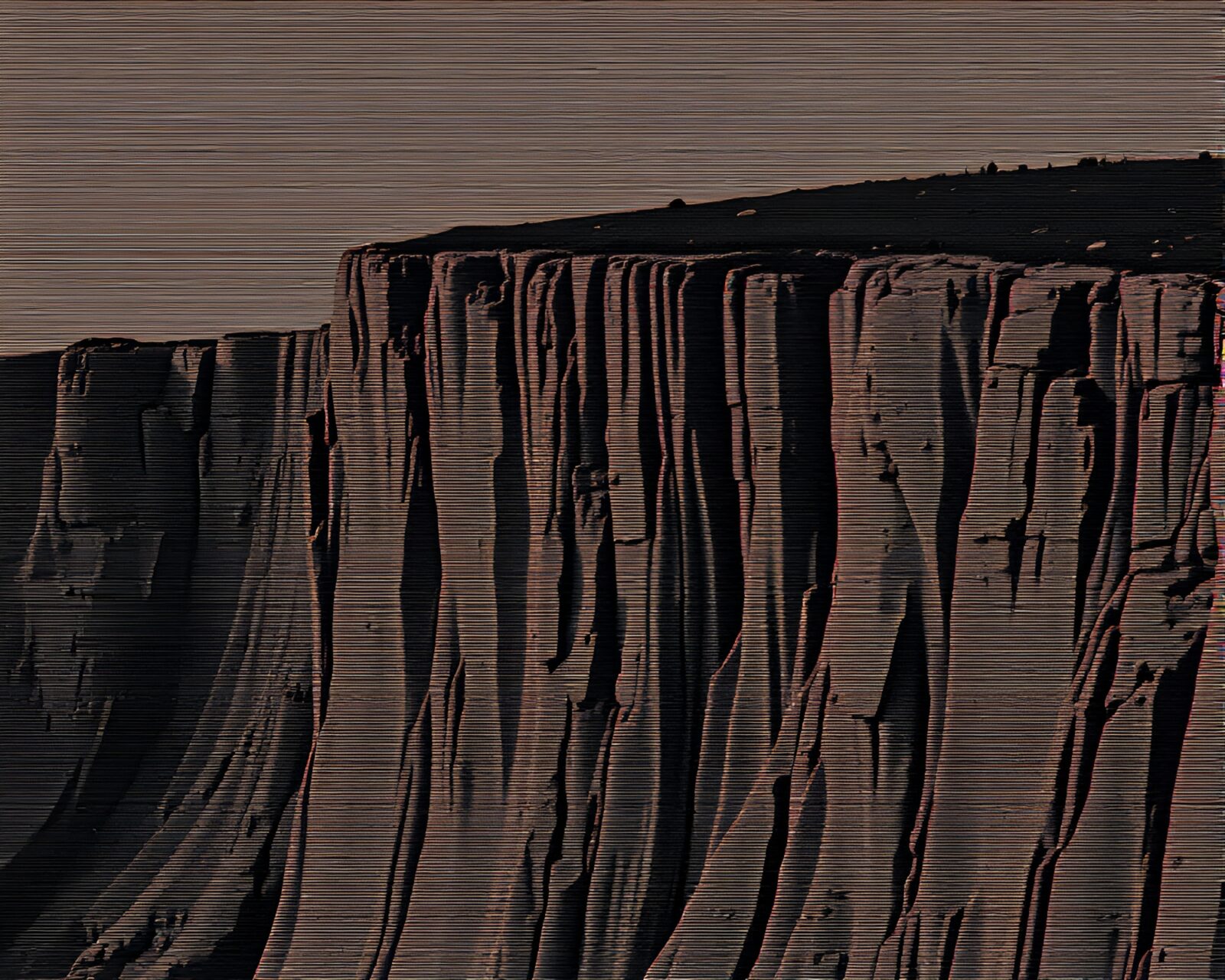 16-bit style cliff captured with grainy film halftone