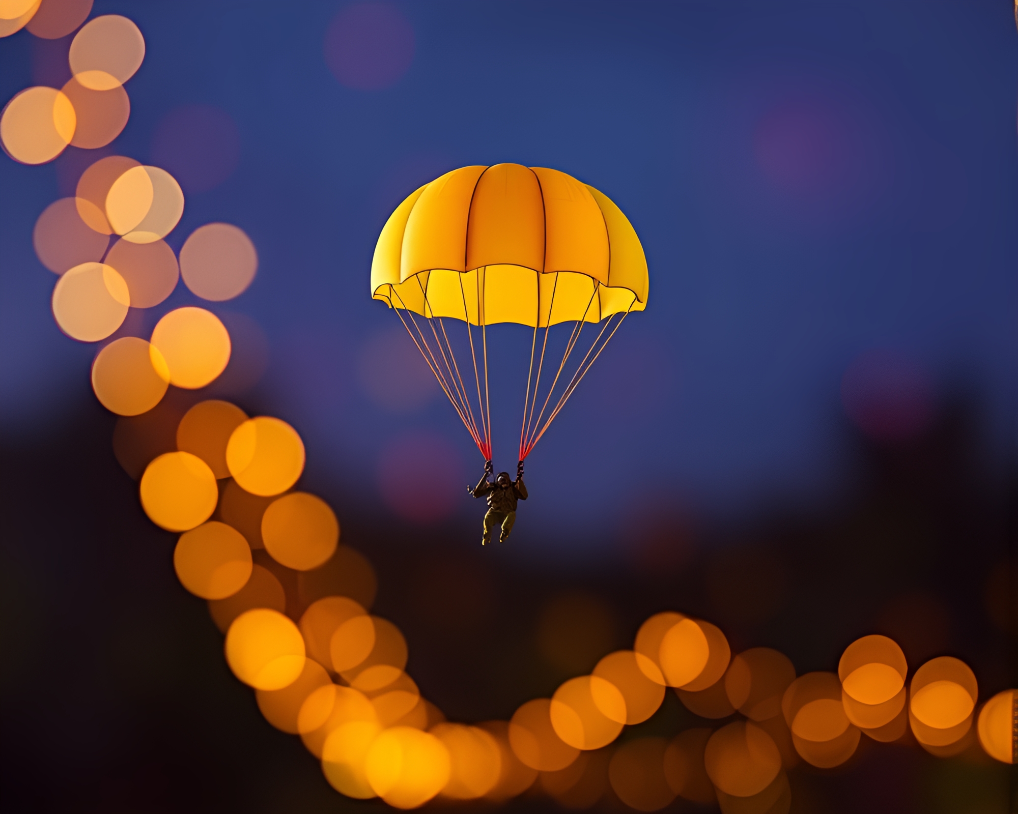 Vibrant Parachute Jumper Amid Bokeh Lights – free AI stock image