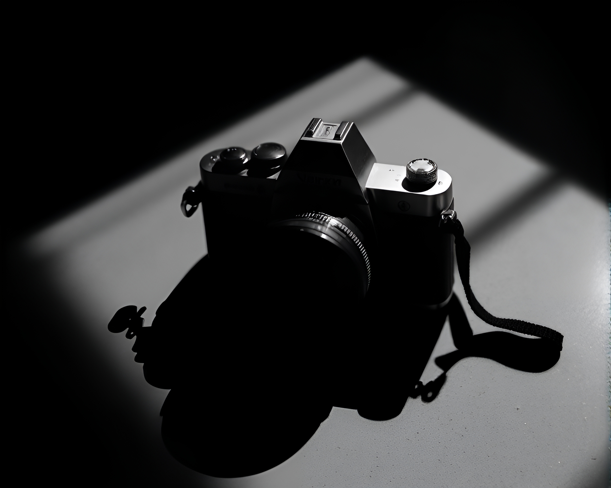 Solitary Camera on Reflective Surface Amid Shadows – free AI stock image