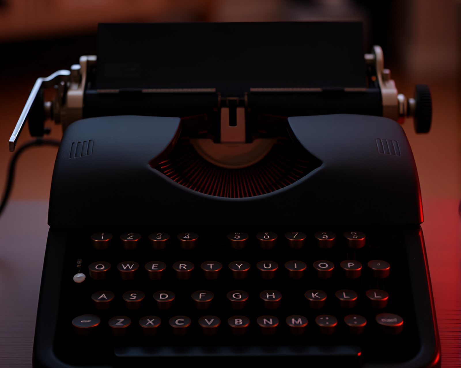 Vintage typewriter with soft pink lighting at sunrise