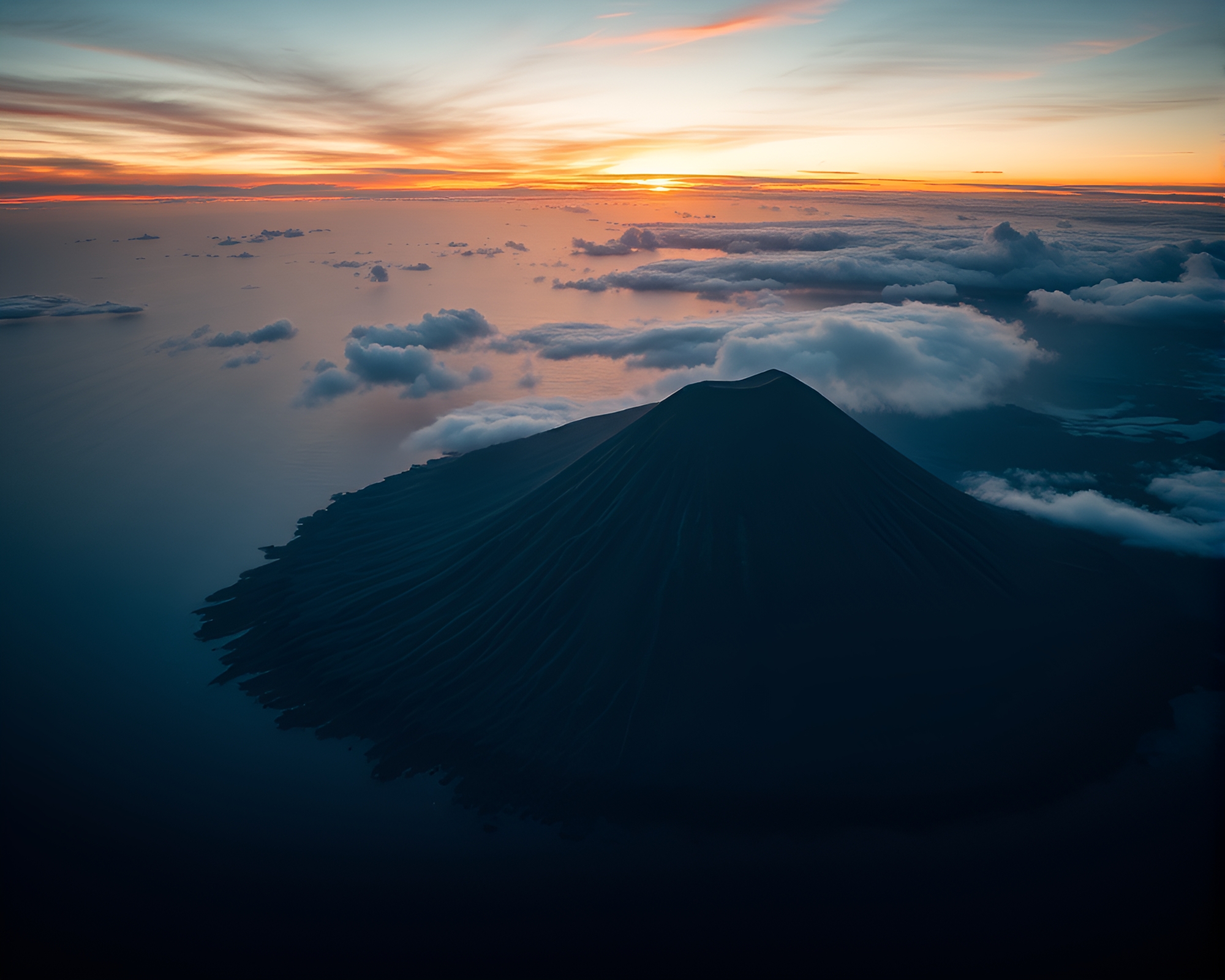 Majestic Volcanic Island Sunrise from Above – free AI stock image