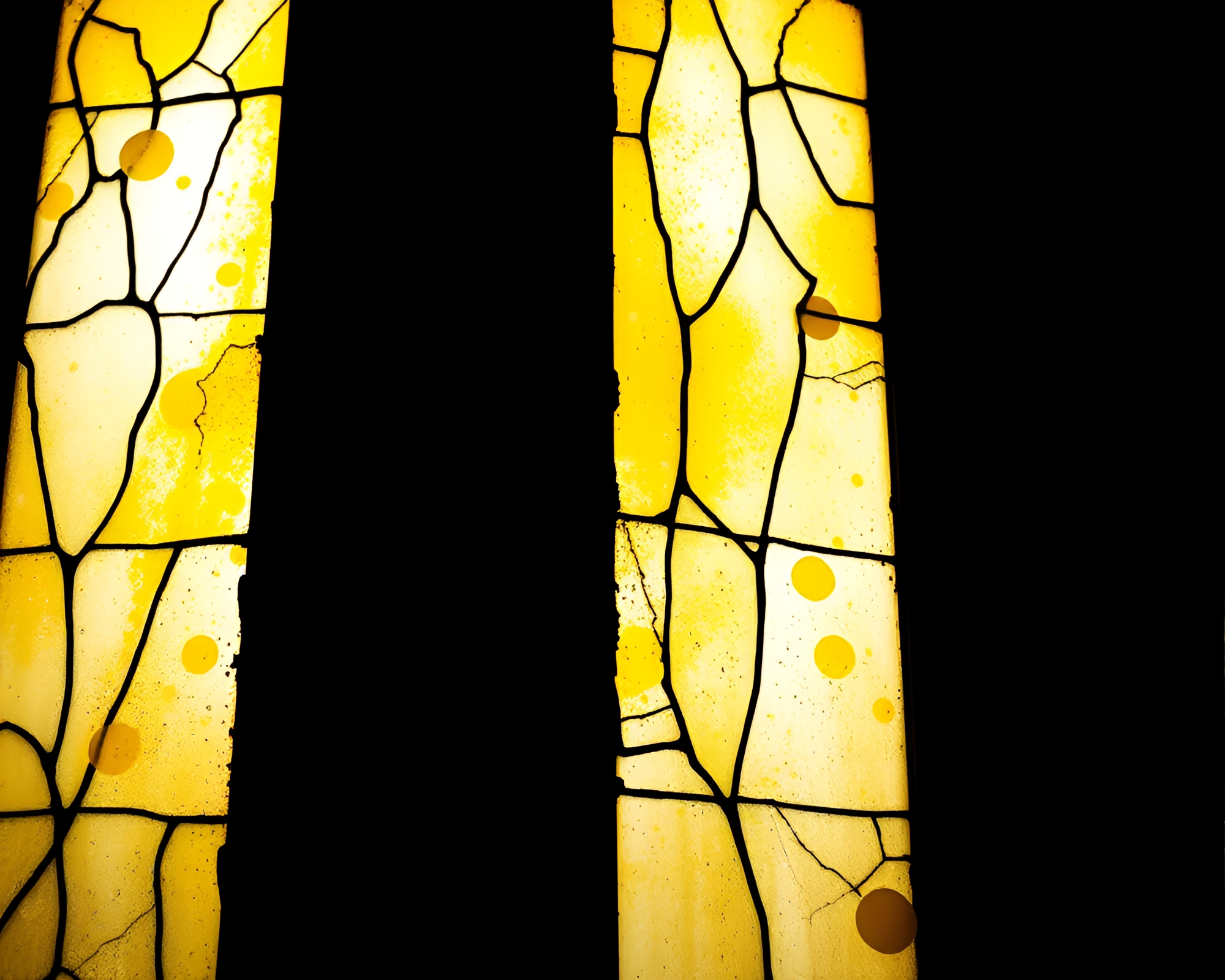 Noir Stained-Glass Window in Monochrome Yellow Hues – free AI stock image