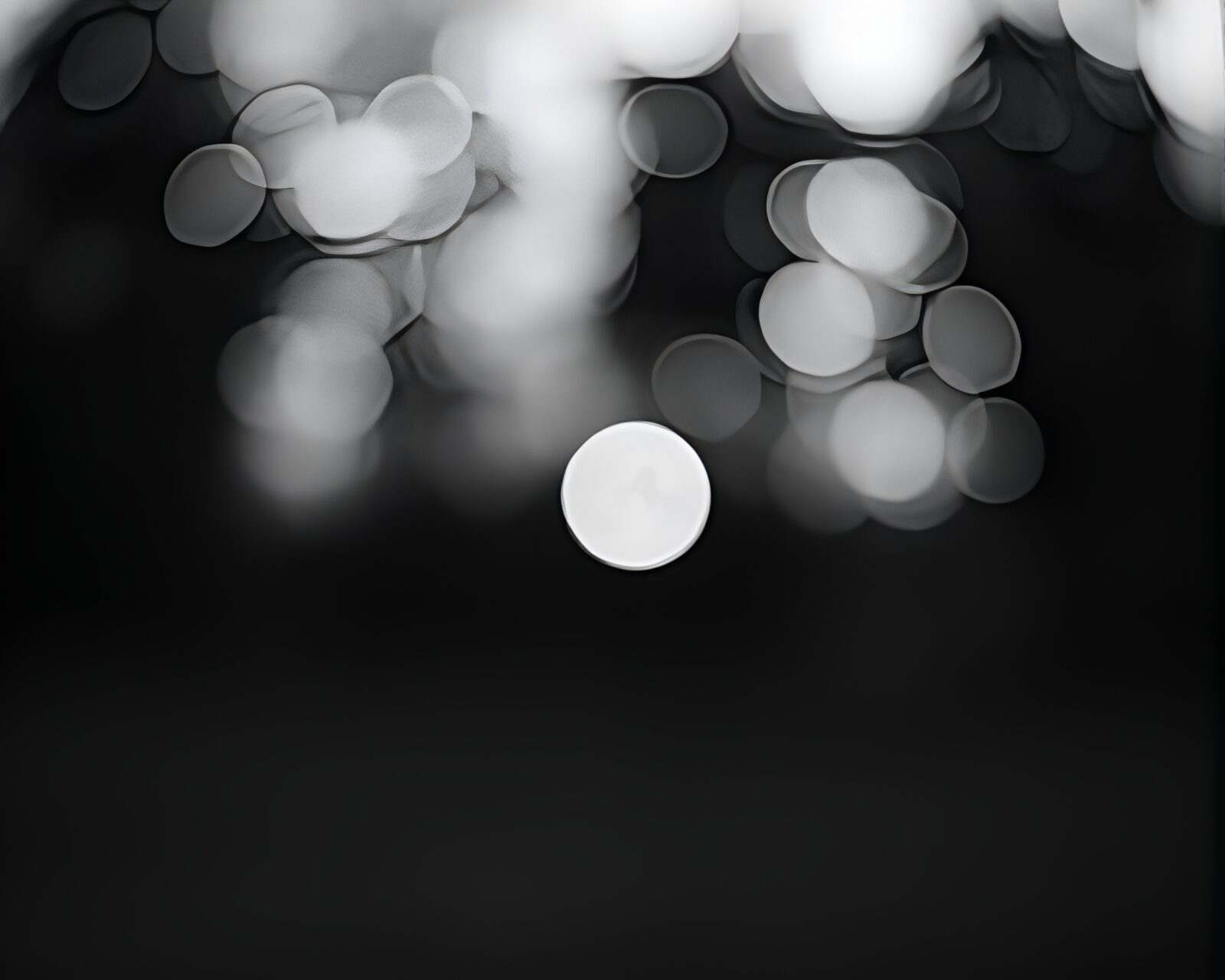Black and white sunset with bokeh foreground in time field