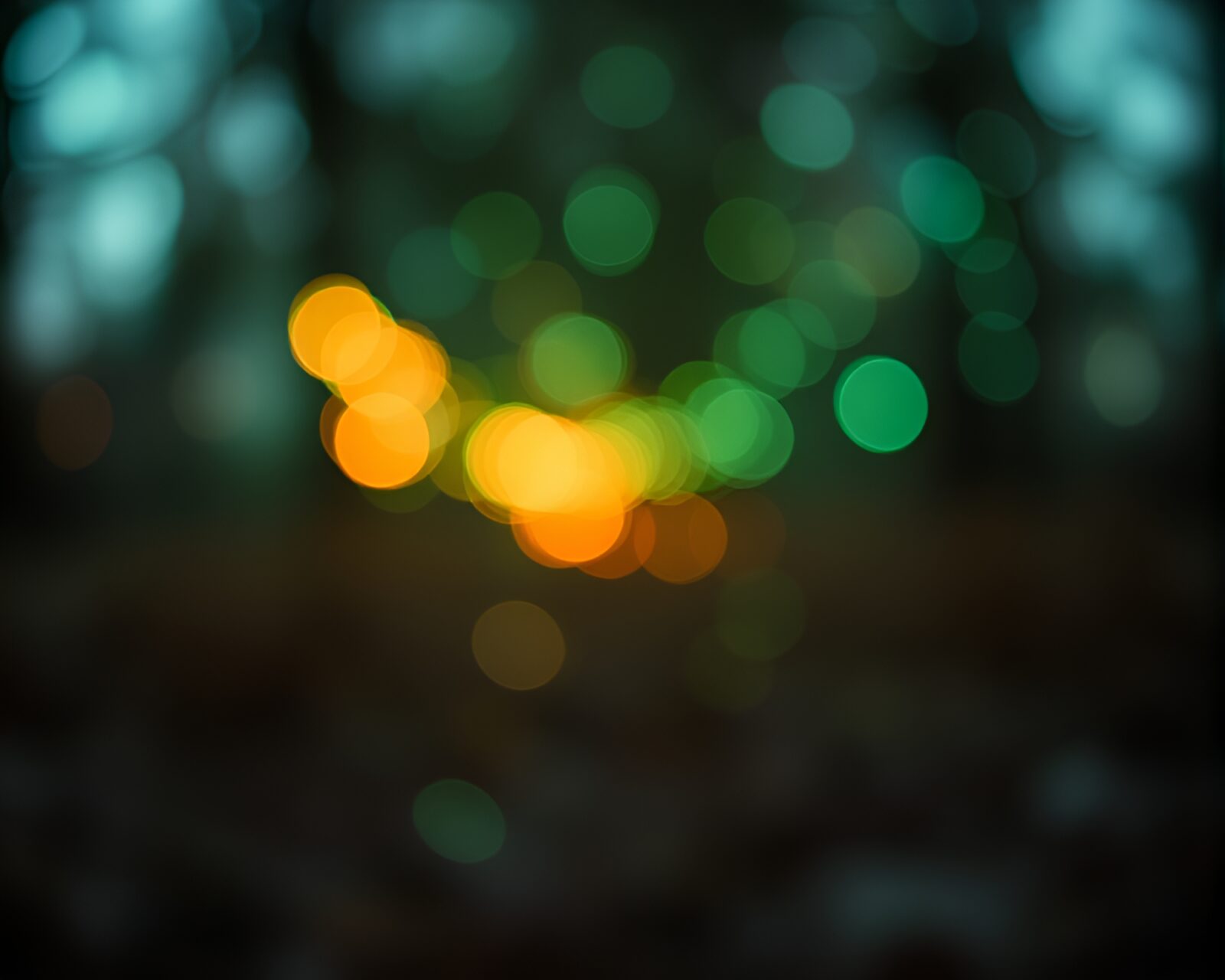 Magical dwarf creating a green patina amulet with bokeh