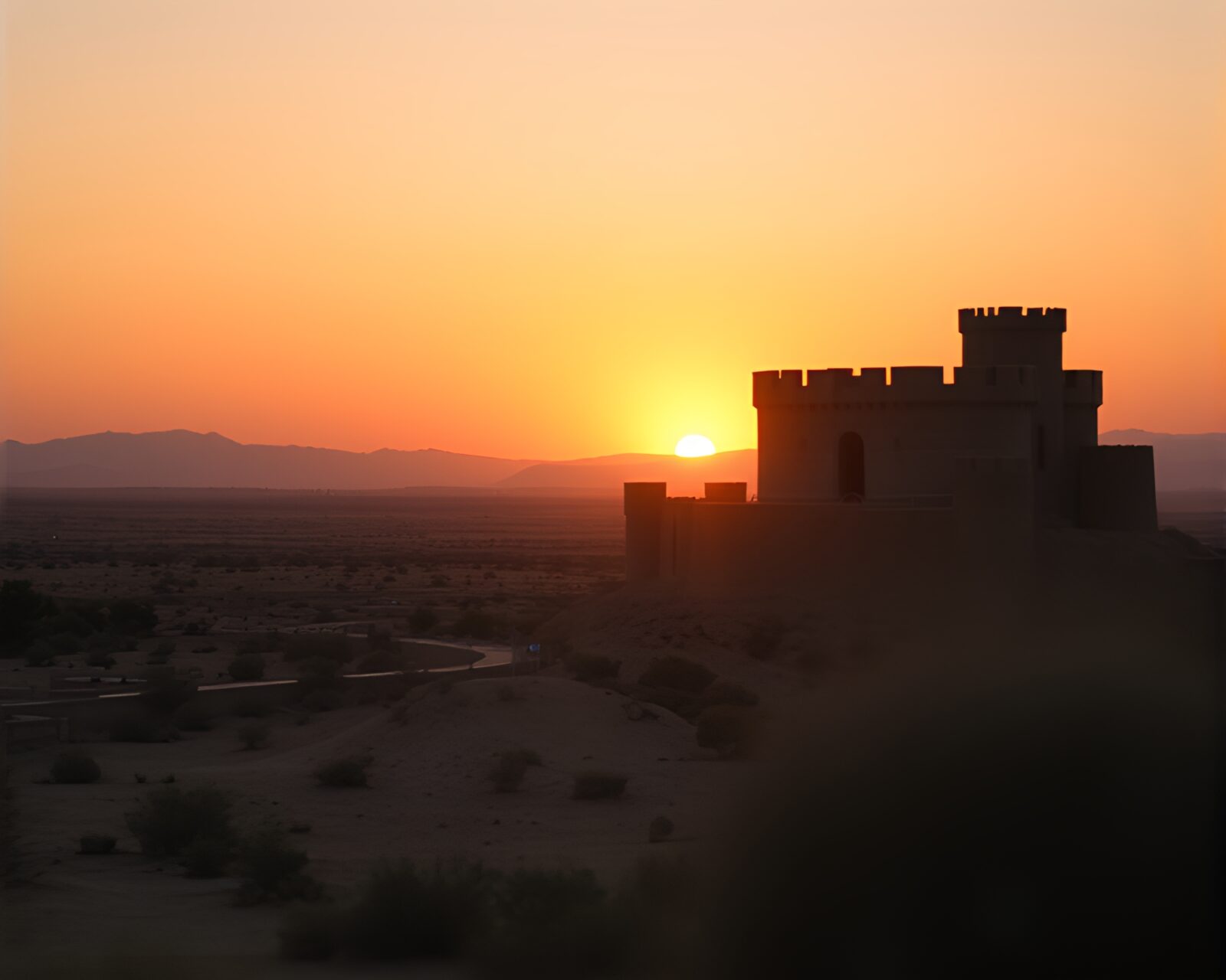 Warm sunset hues illuminate deserted castle in selective color